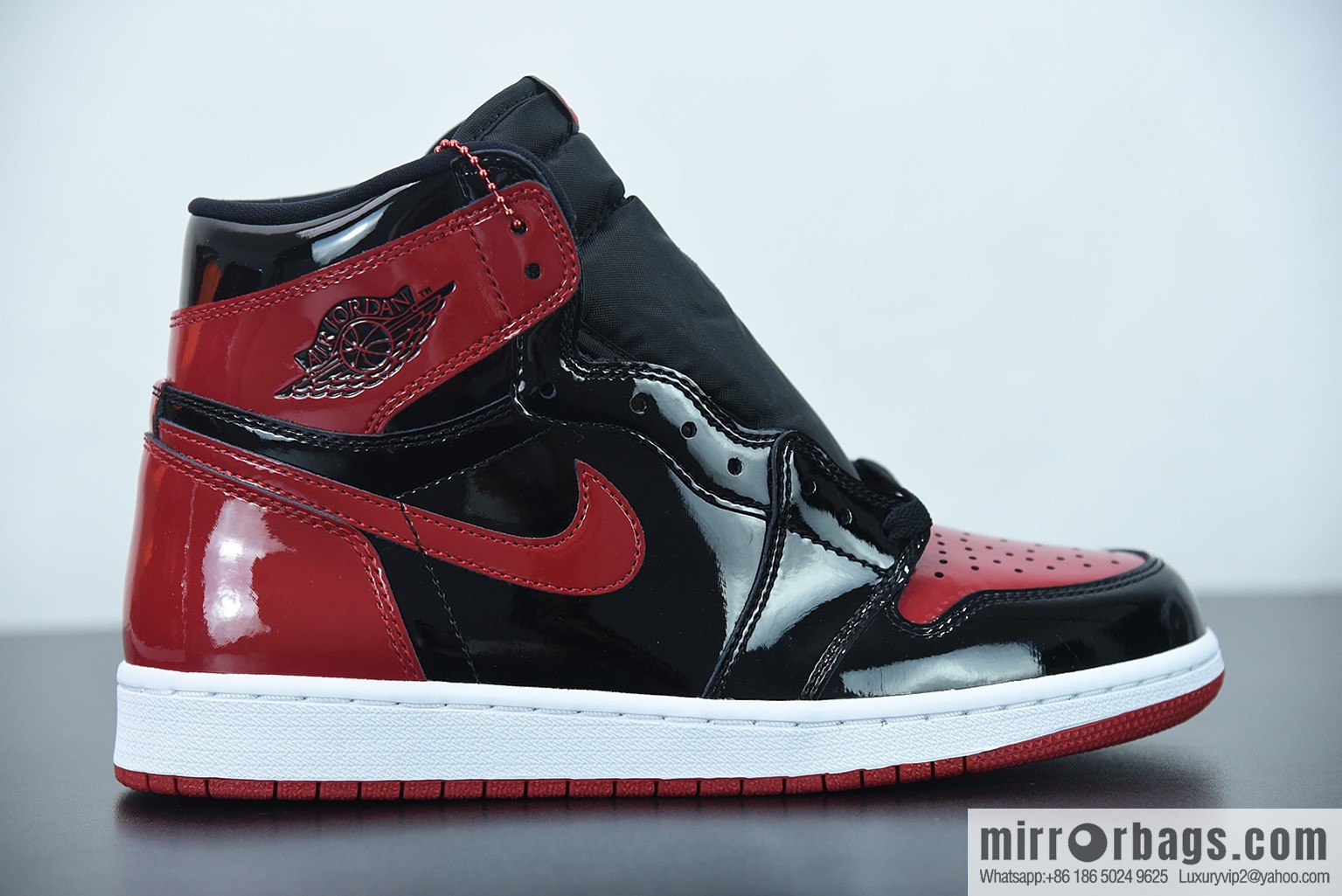 Air Jordan 1 AJ1 Jordan 1st generation high-top basketball shoes/patent leather black and red, prohibited, item number: 555088-063