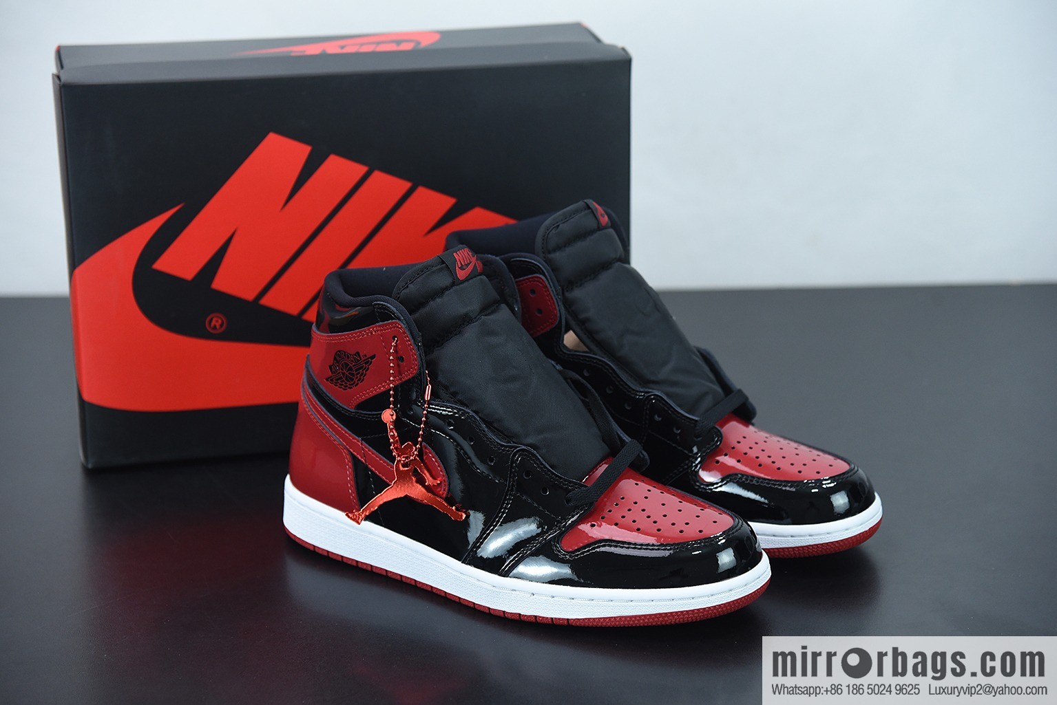 Air Jordan 1 AJ1 Jordan 1st generation high-top basketball shoes/patent leather black and red, prohibited, item number: 555088-063