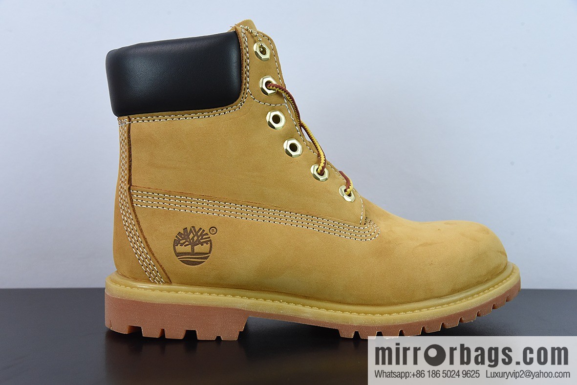 Timberland classic big yellow boots, seven-hole men's size 10061, six-hole women's size 10361.