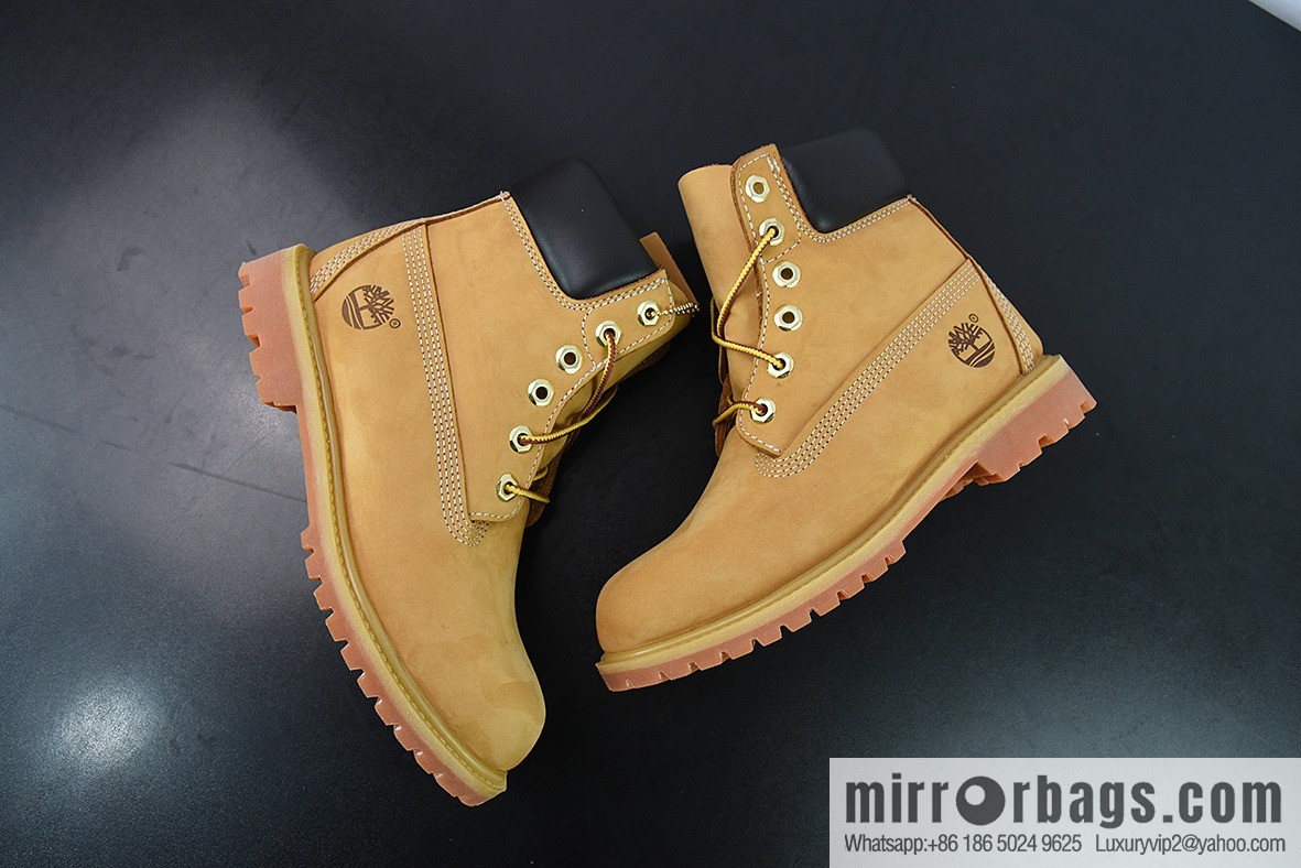 Timberland classic big yellow boots, seven-hole men's size 10061, six-hole women's size 10361.