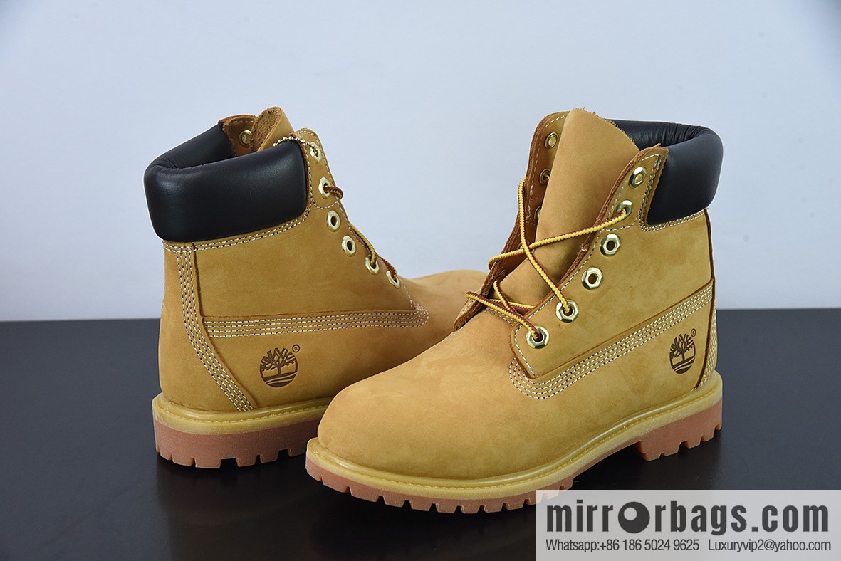 Timberland classic big yellow boots, seven-hole men's size 10061, six-hole women's size 10361.