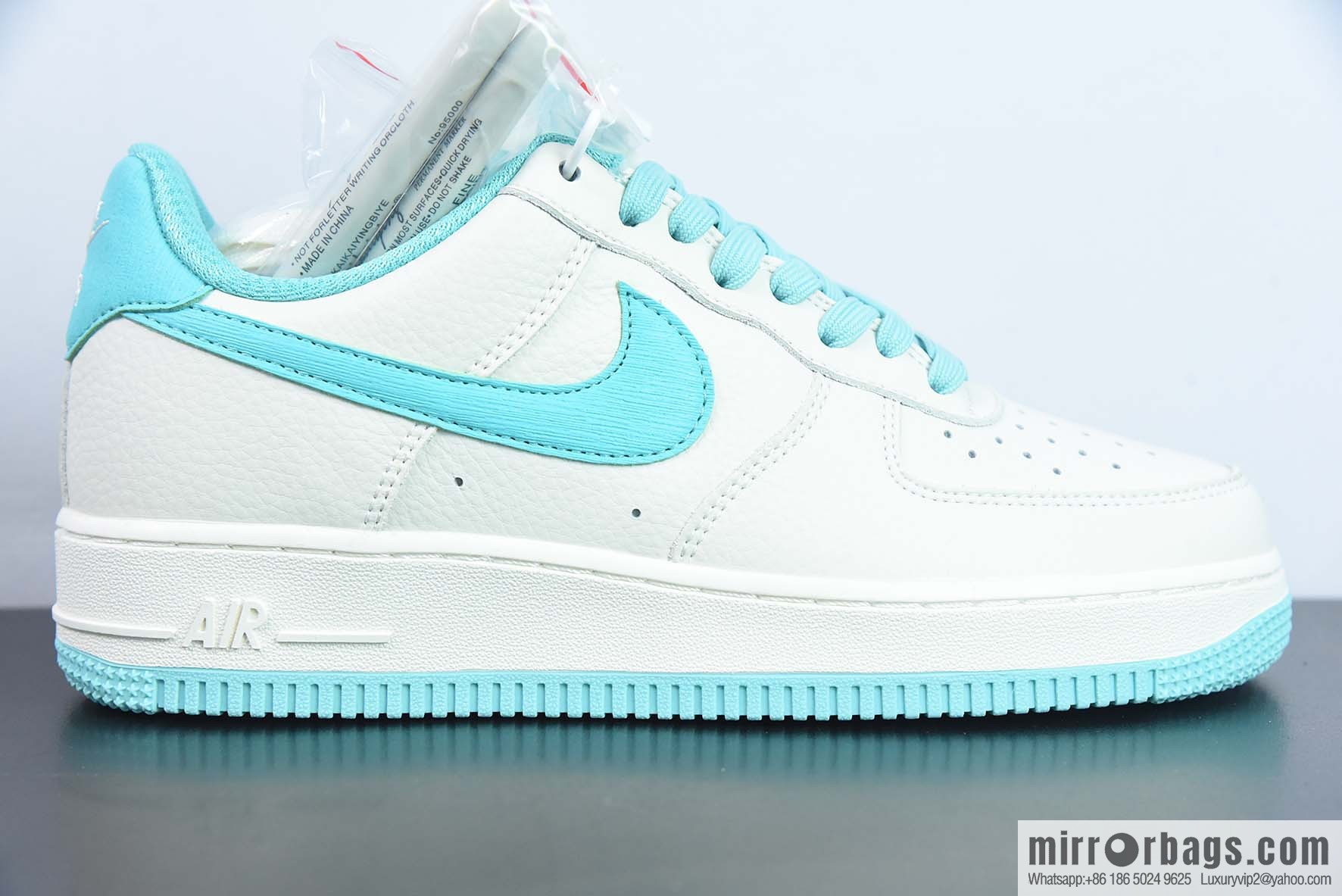 Air Force 1 '07 Low Air Force One Tiffany & Co. White and blue sneakers Item number: TP0096 255