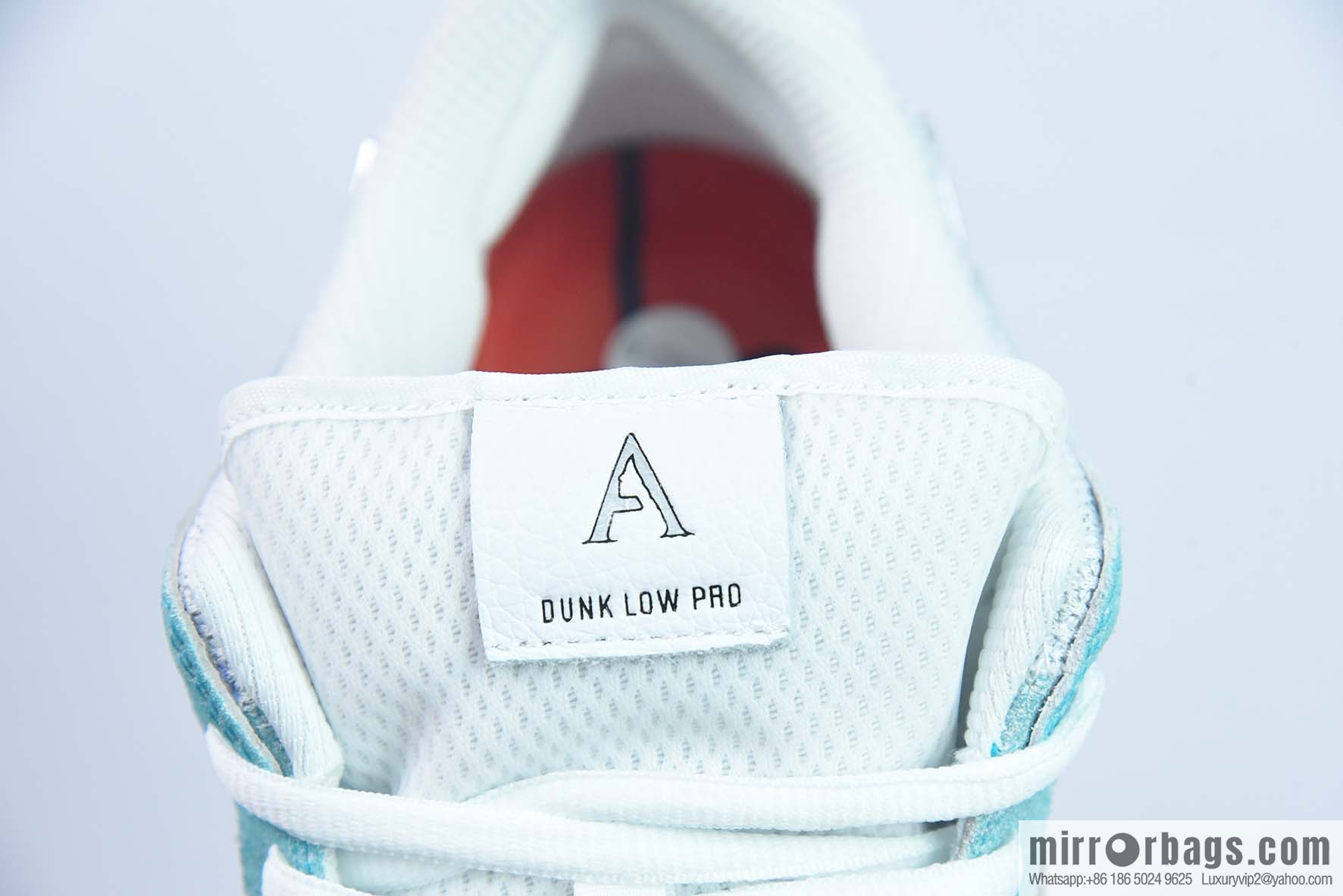 April Skateboards x Nike SB Dunk Low Frozen Rose Sneakers Ice Blue Part Number: FD2562-400