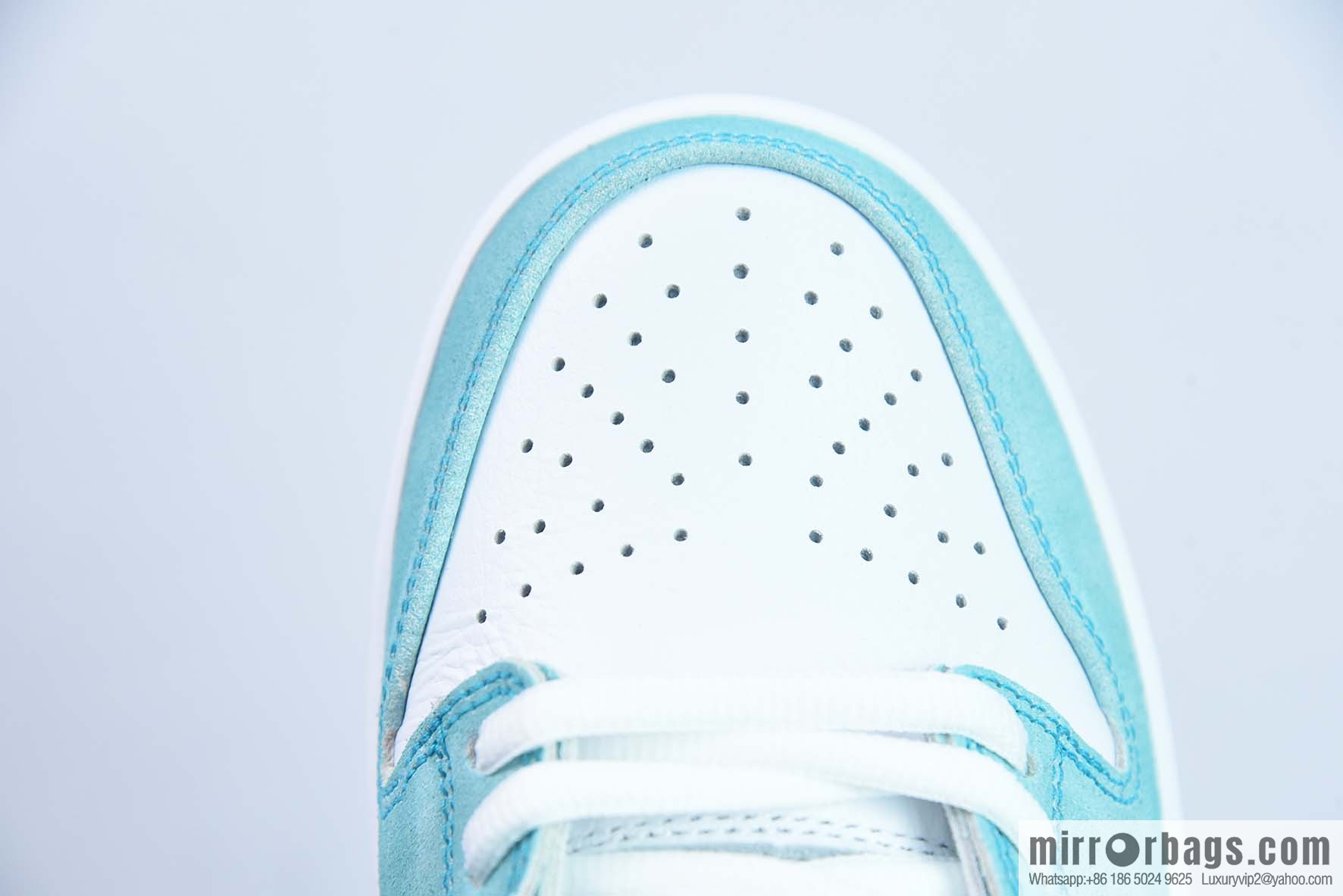April Skateboards x Nike SB Dunk Low Frozen Rose Sneakers Ice Blue Part Number: FD2562-400