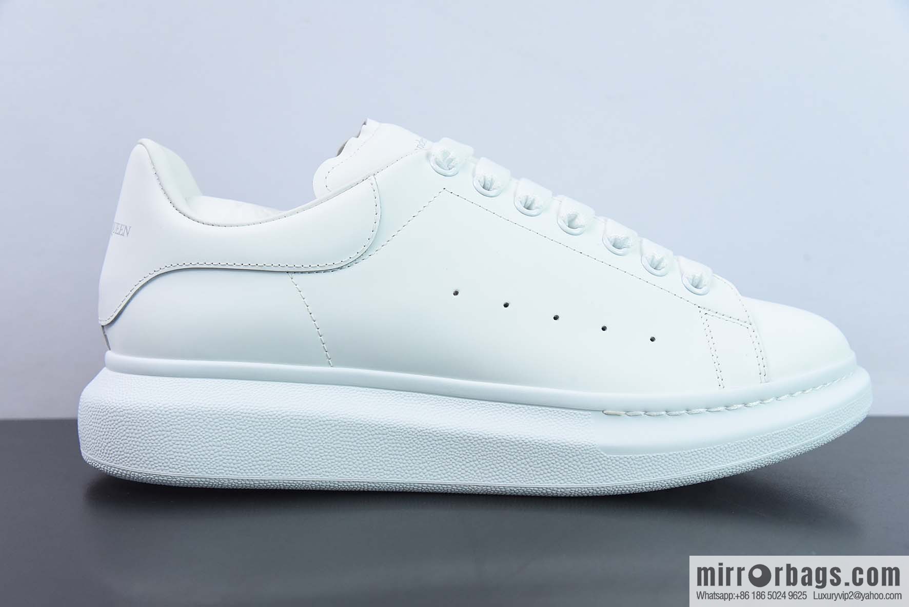 Alexander McQueen, pure white low-top sneakers