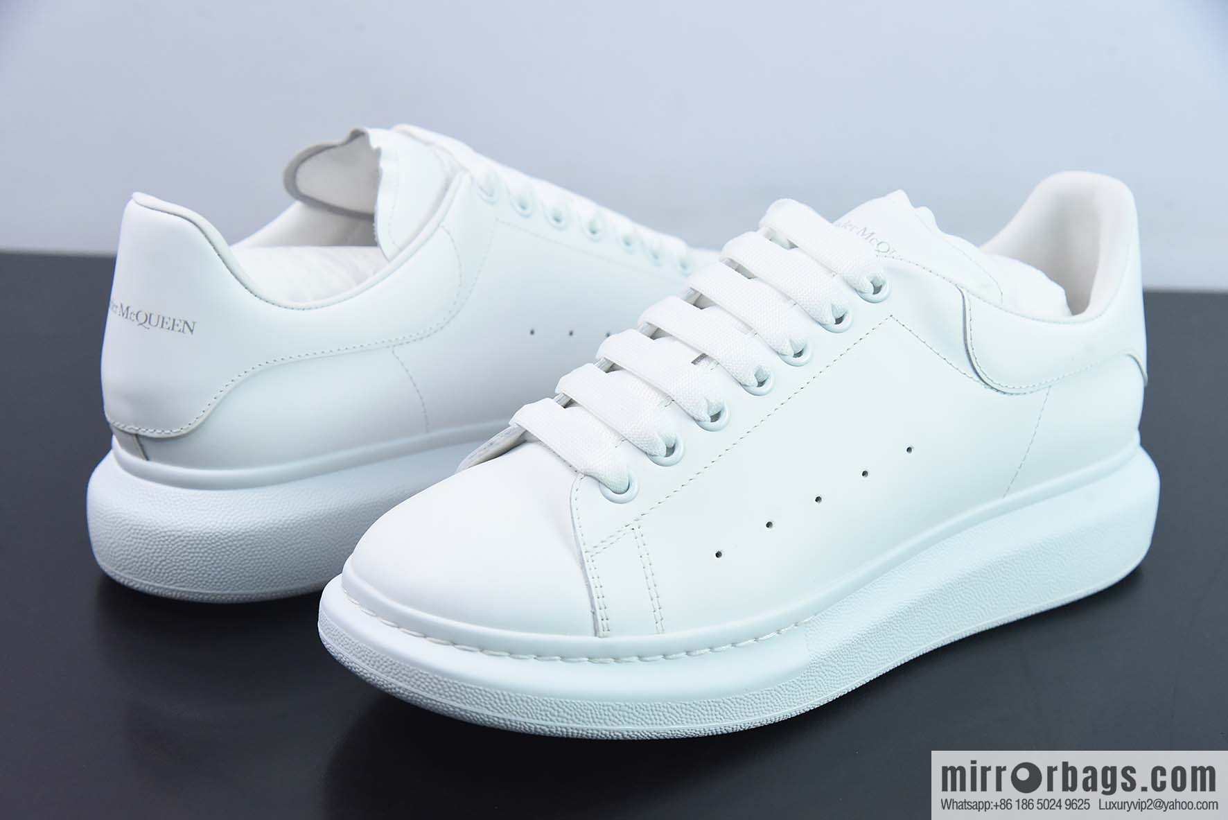 Alexander McQueen, pure white low-top sneakers