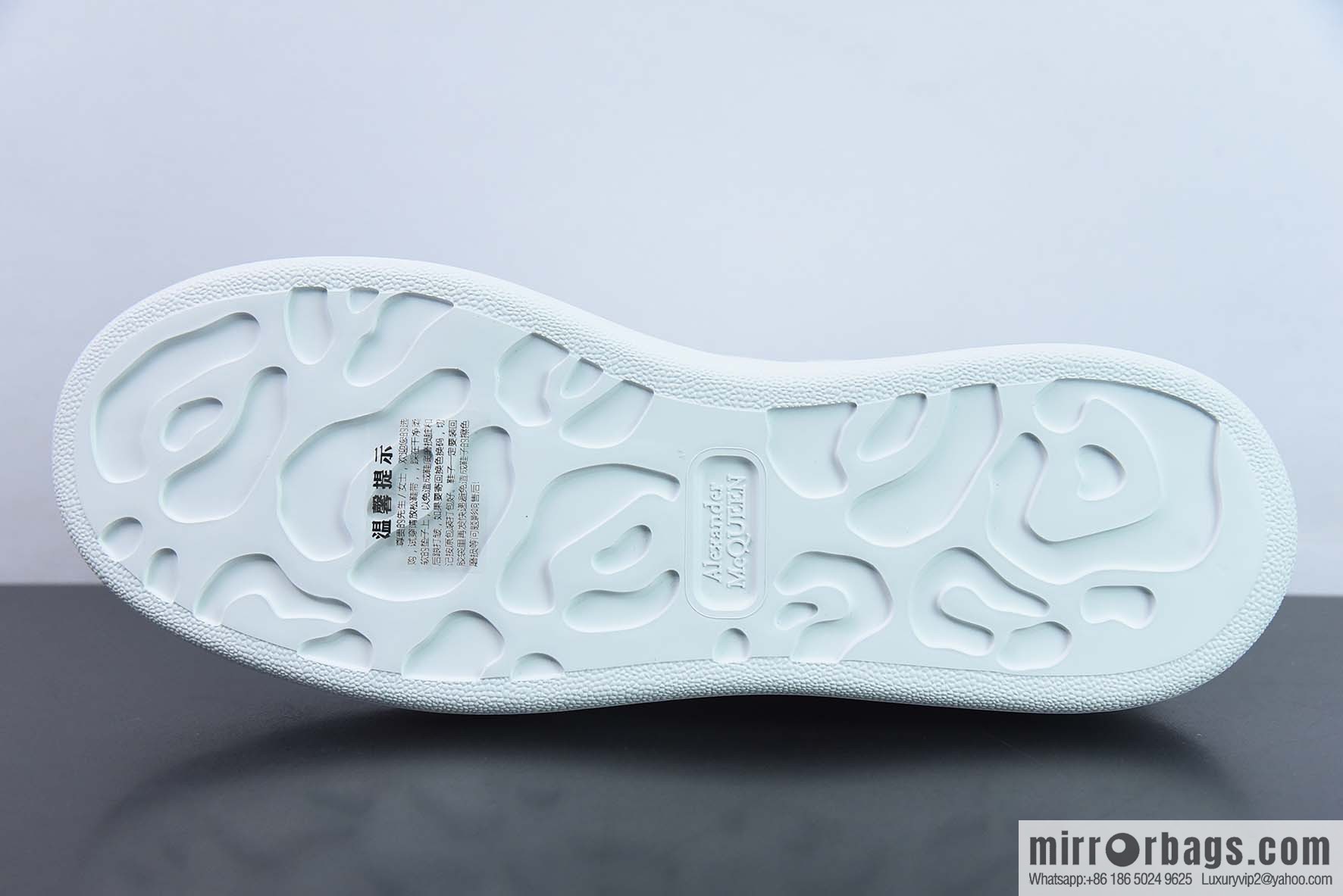 Alexander McQueen, pure white low-top sneakers