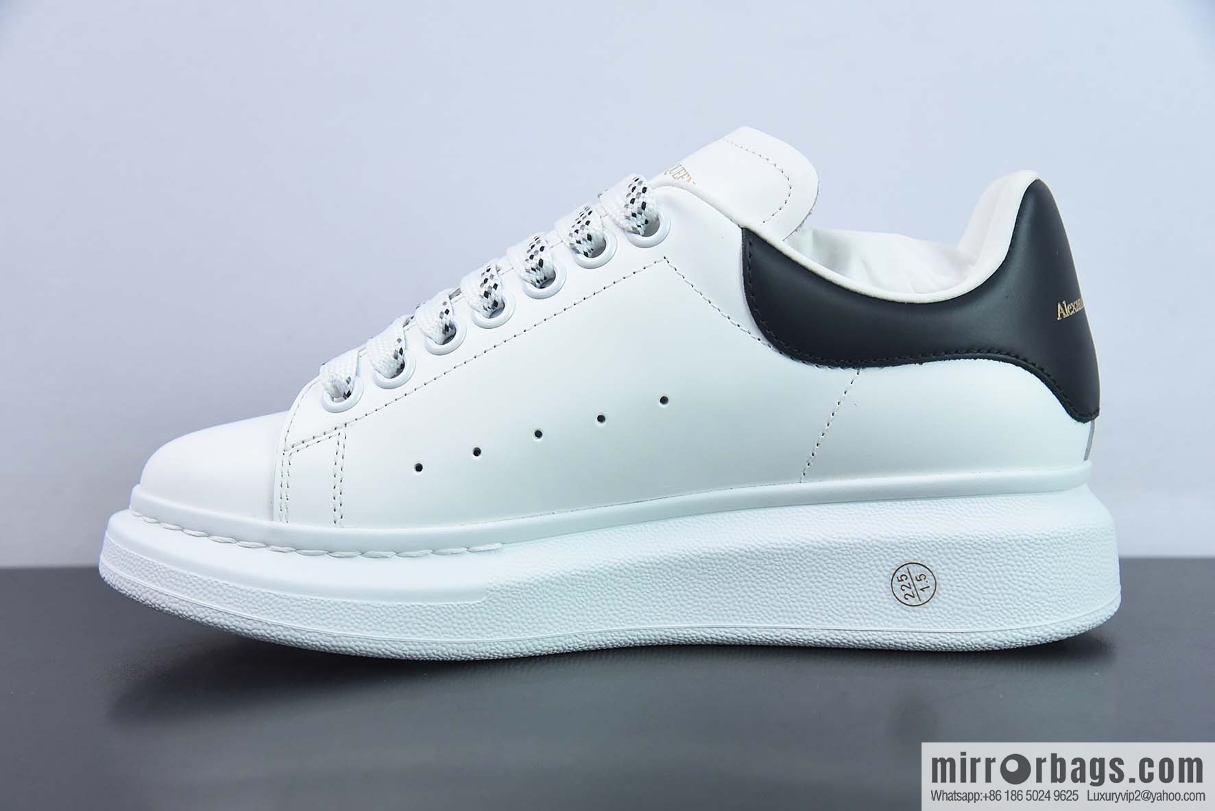 Alexander McQueen, black shiny low-top sneakers