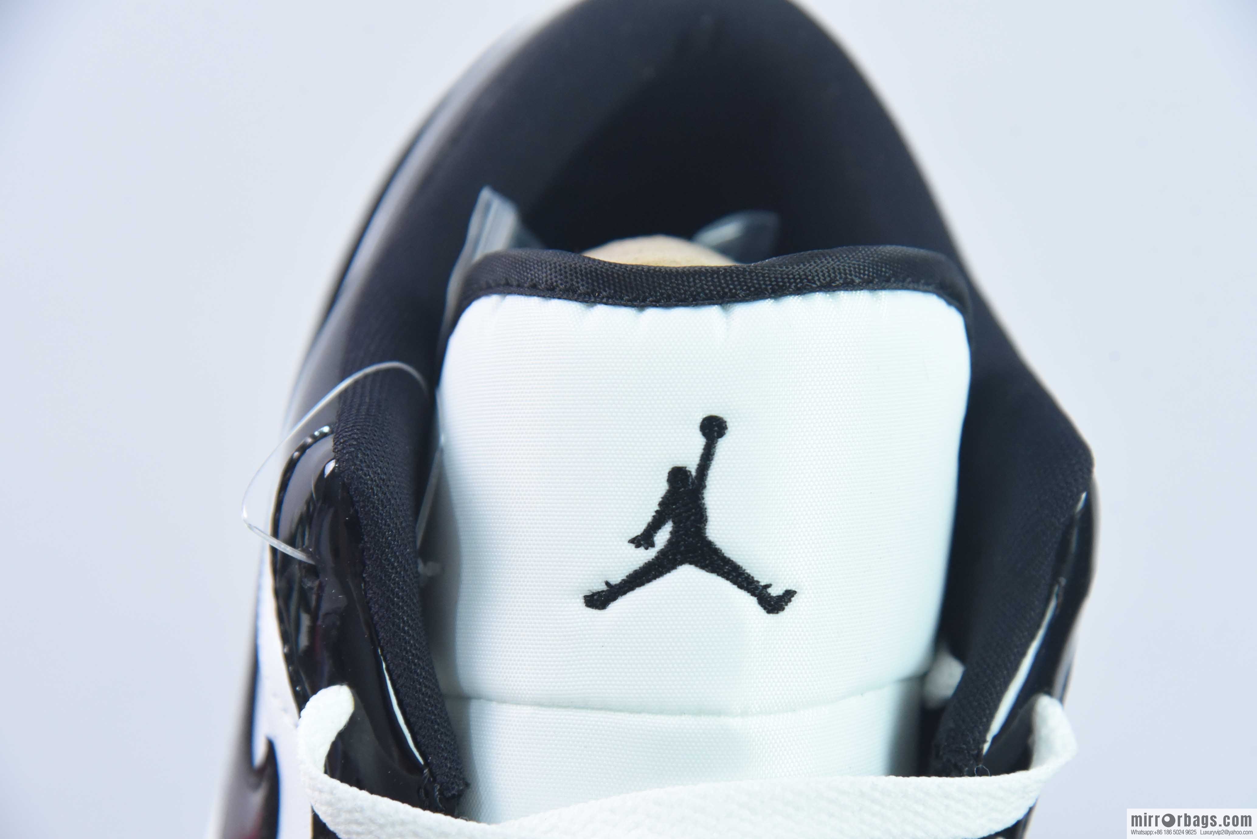 Nike Dunk Low Retro black and white patent leather sneakers DV1390-100