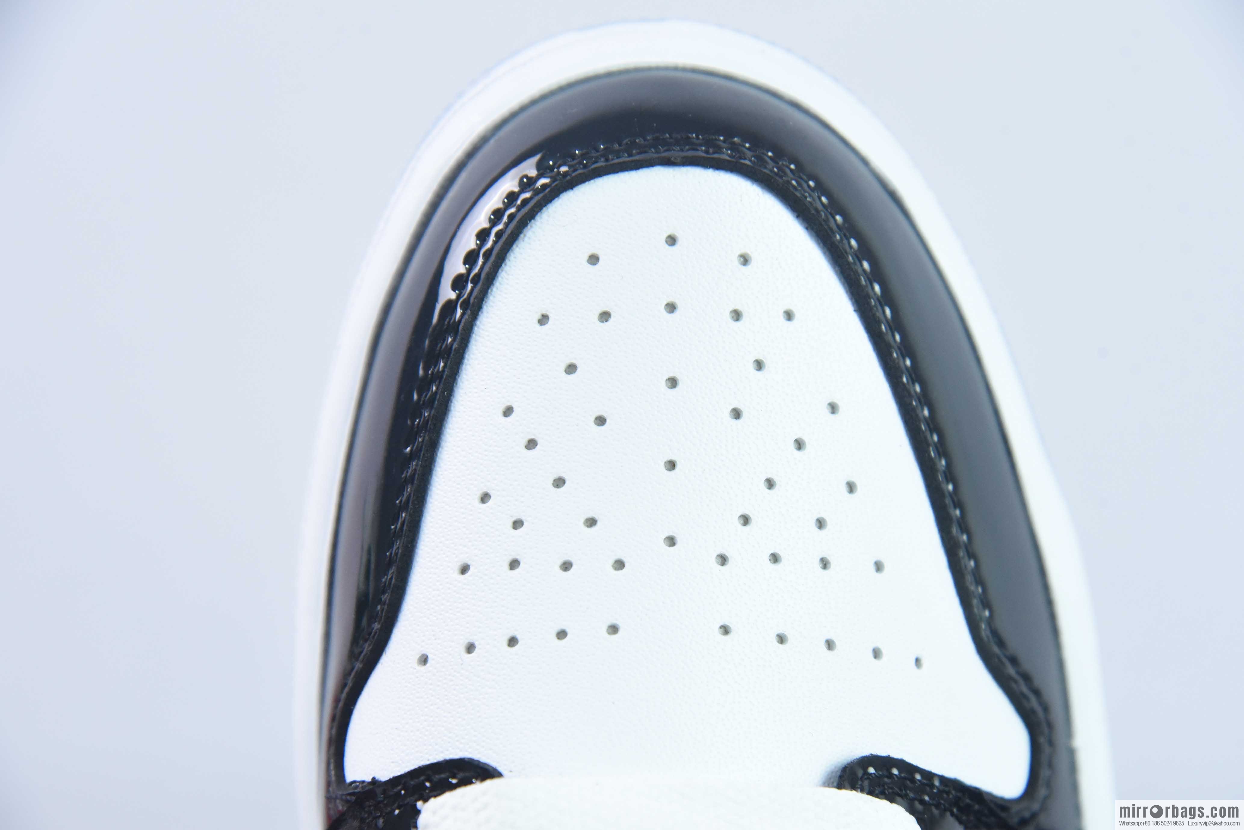 Nike Dunk Low Retro black and white patent leather sneakers DV1390-100
