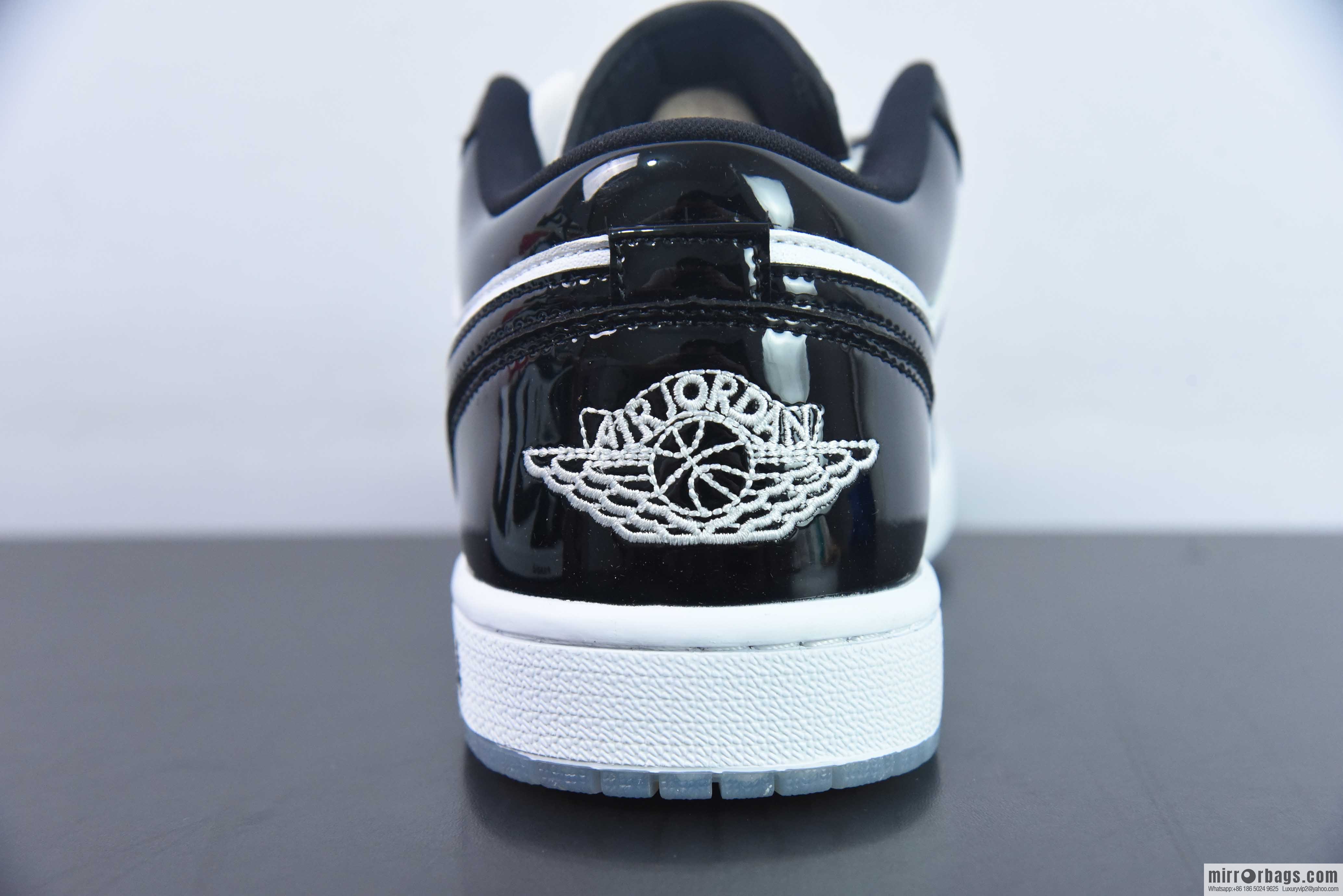 Nike Dunk Low Retro black and white patent leather sneakers DV1390-100