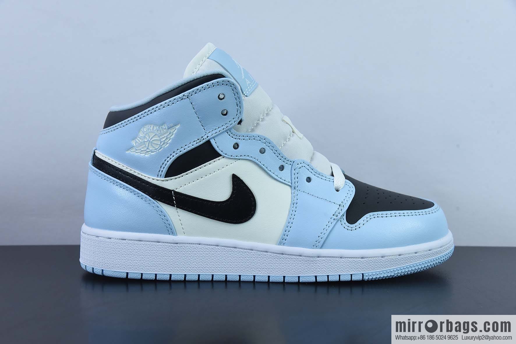AJ1Mid Middle Gang, white, black and blue, item number 555112-401.