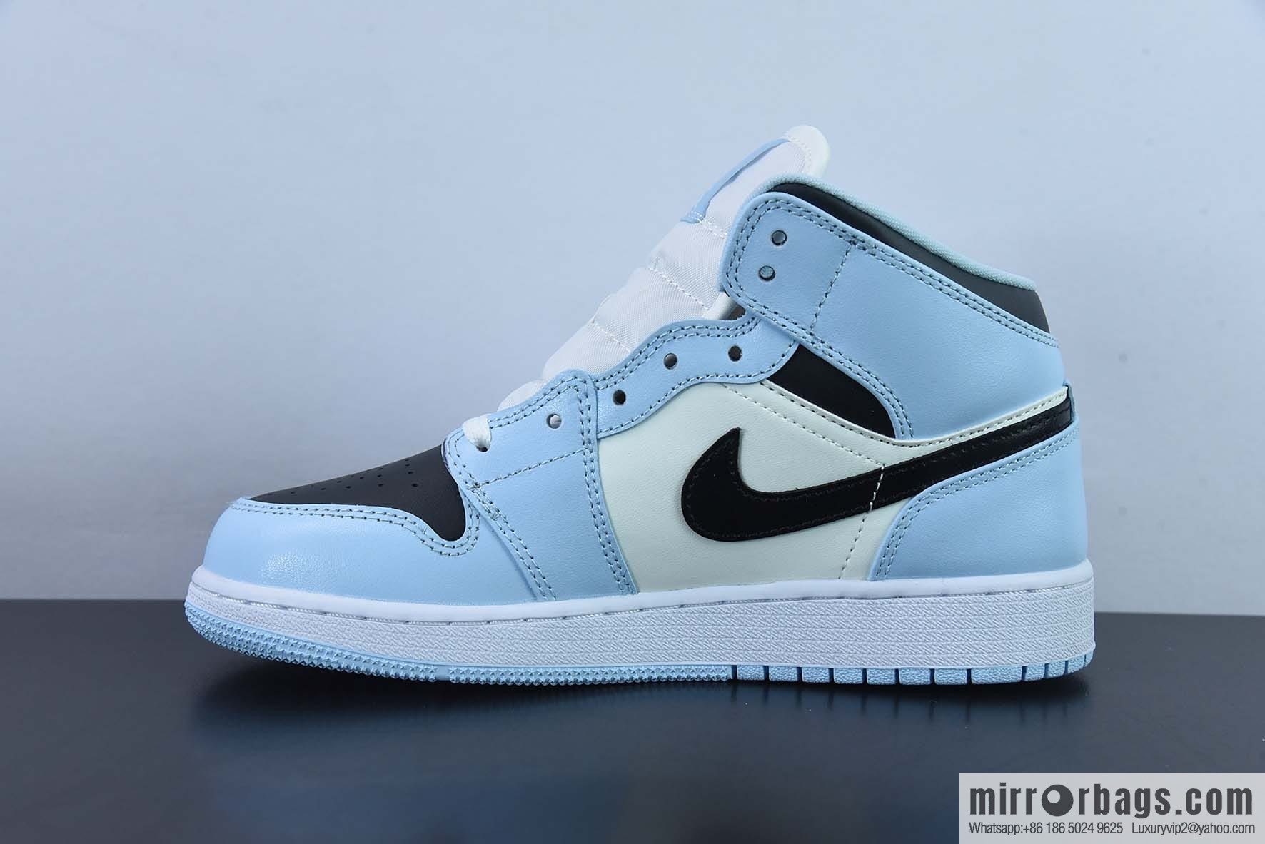 AJ1Mid Middle Gang, white, black and blue, item number 555112-401.