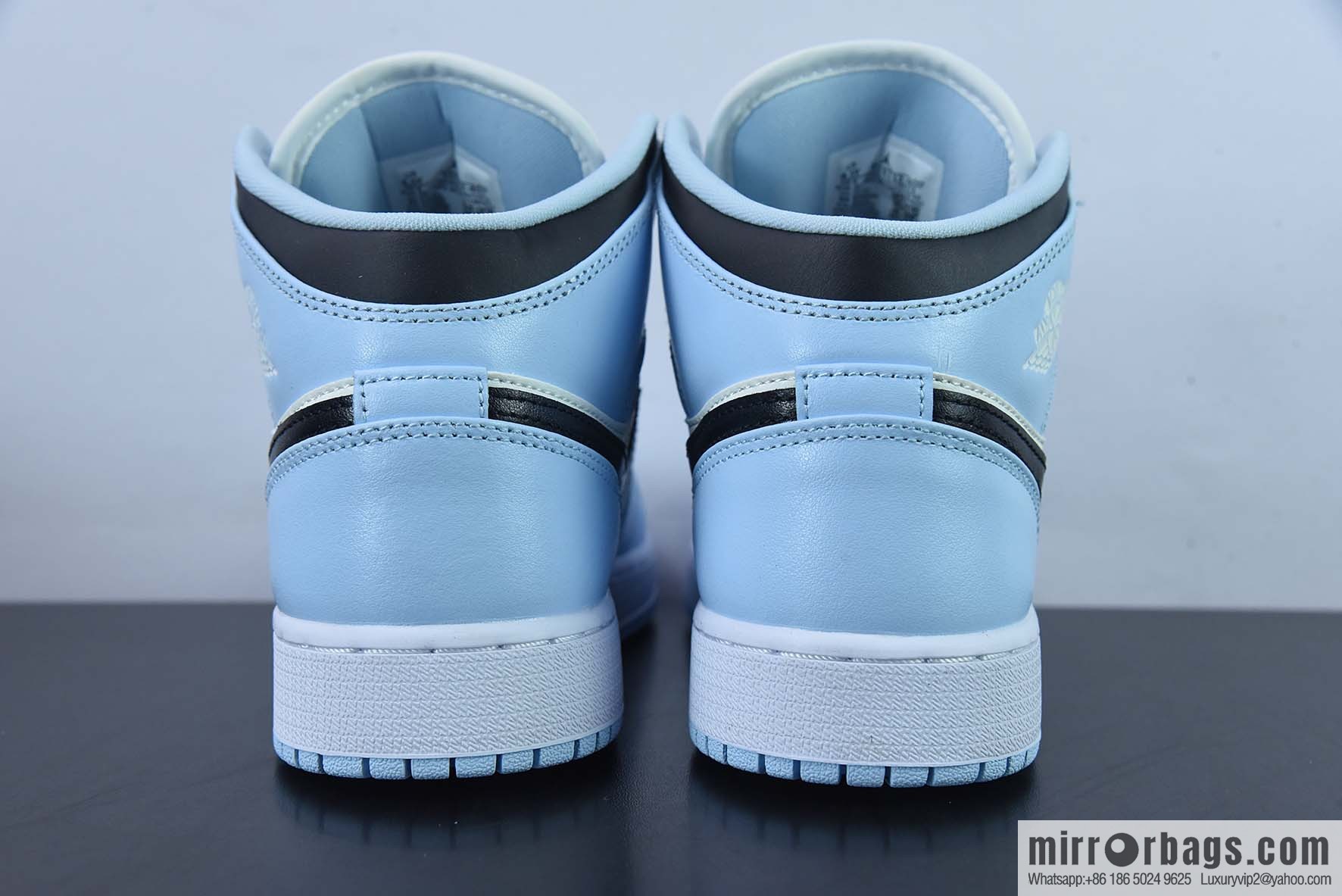 AJ1Mid Middle Gang, white, black and blue, item number 555112-401.