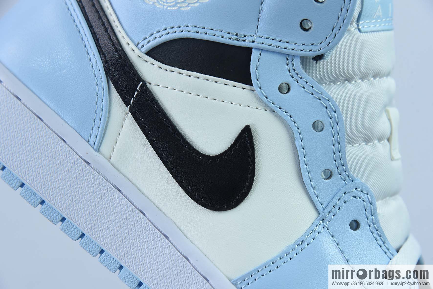 AJ1Mid Middle Gang, white, black and blue, item number 555112-401.