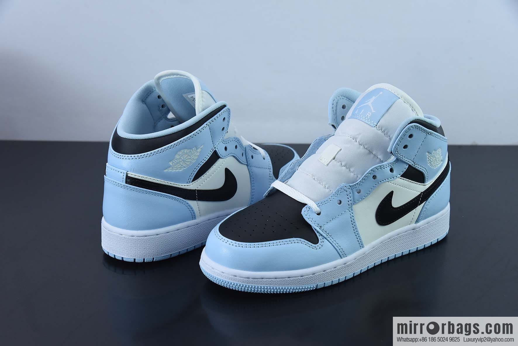 AJ1Mid Middle Gang, white, black and blue, item number 555112-401.