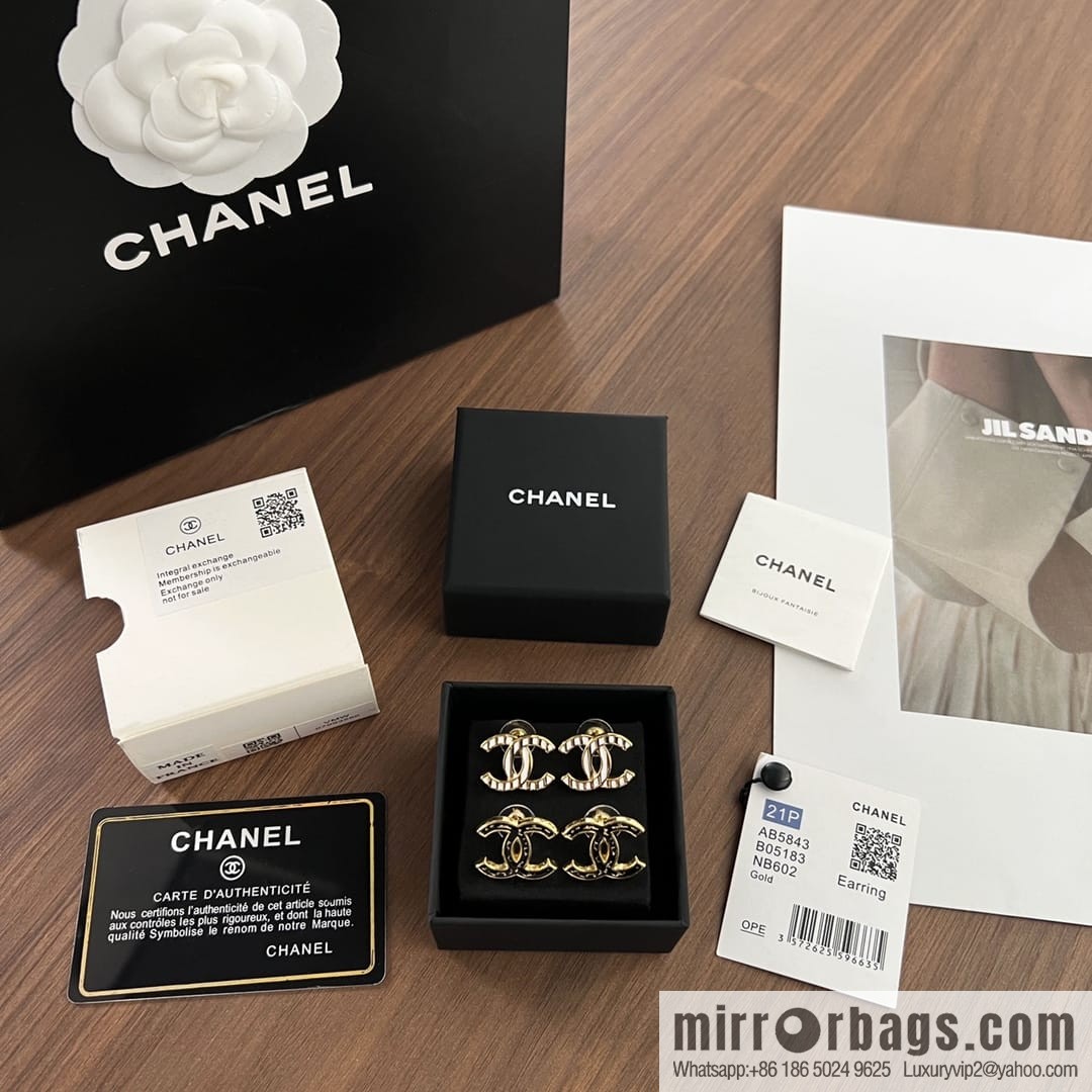 New ☑️ CHANEL Chanel c1 double c white wavy black gold edge stud earrings