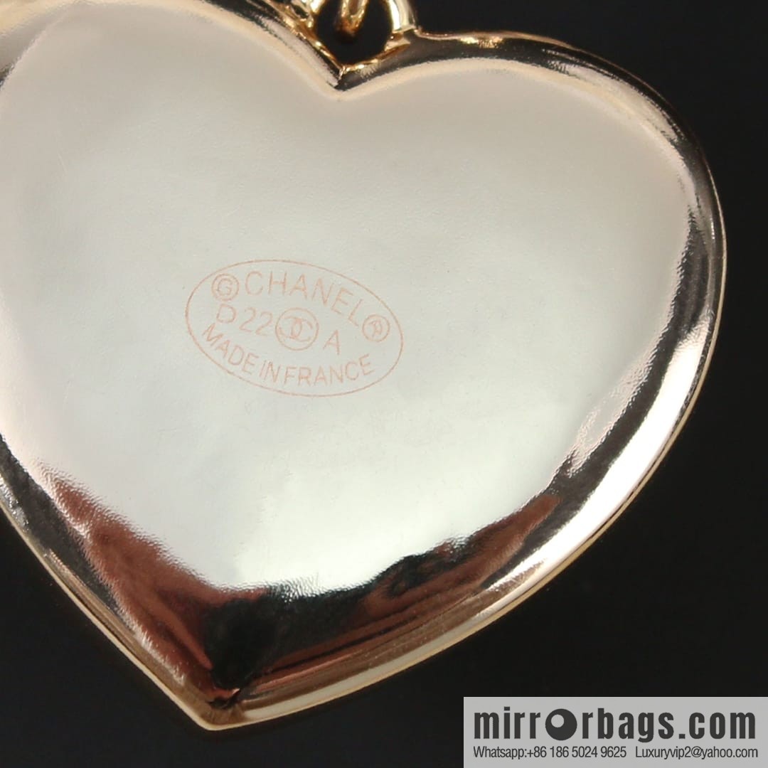 New ☑️ CHANEL Chanel c2 double c rhombus peach heart love stud earrings