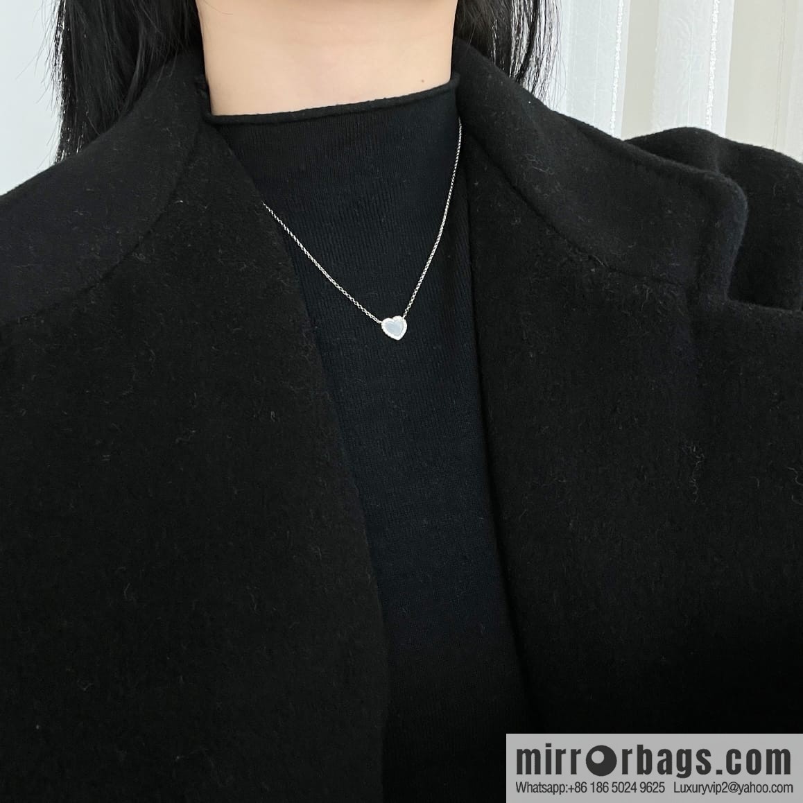 APM Monaco white mother shell love necklace adjustable