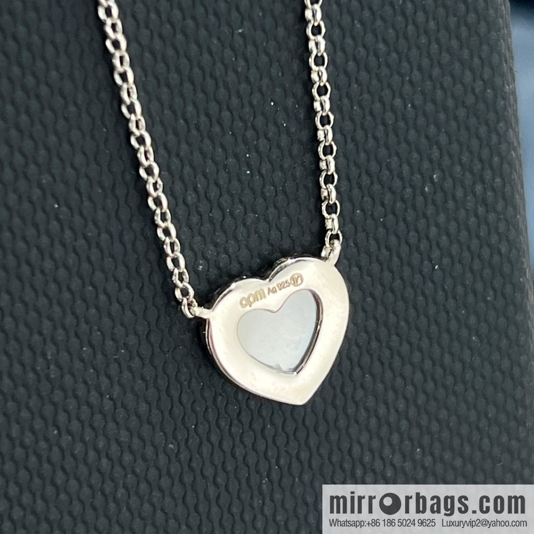 APM Monaco white mother shell love necklace adjustable