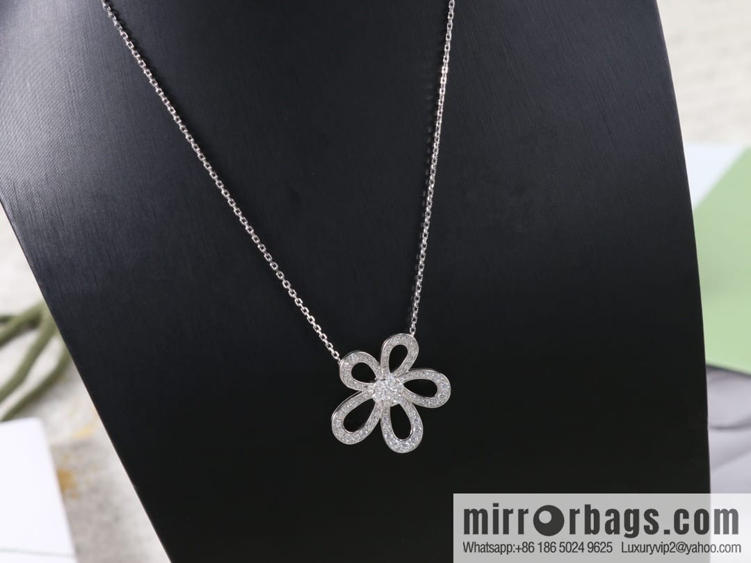 Van Cleef & Arpels Rose de Noel Diamond flower necklace earrings
