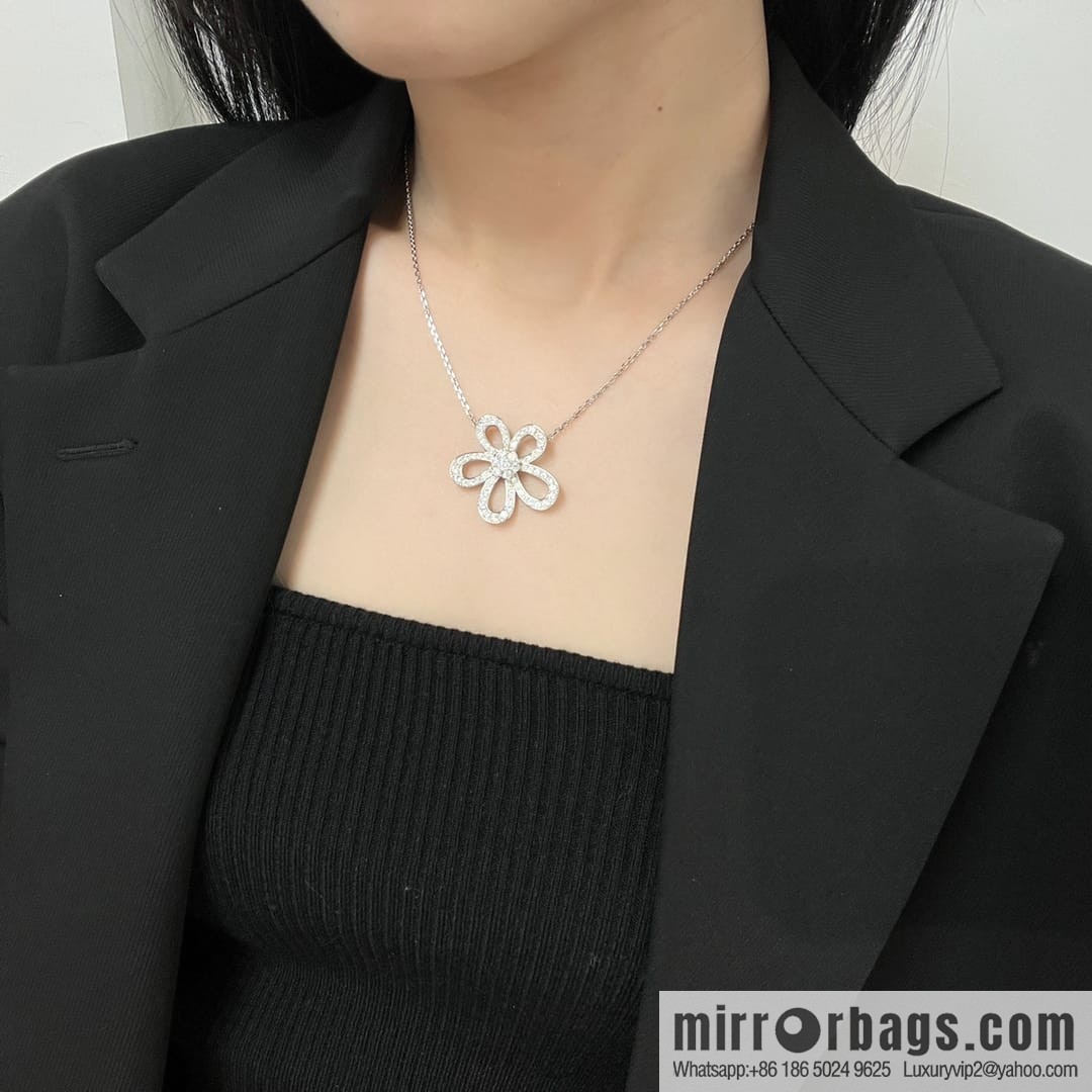 Van Cleef & Arpels Rose de Noel Diamond flower necklace earrings