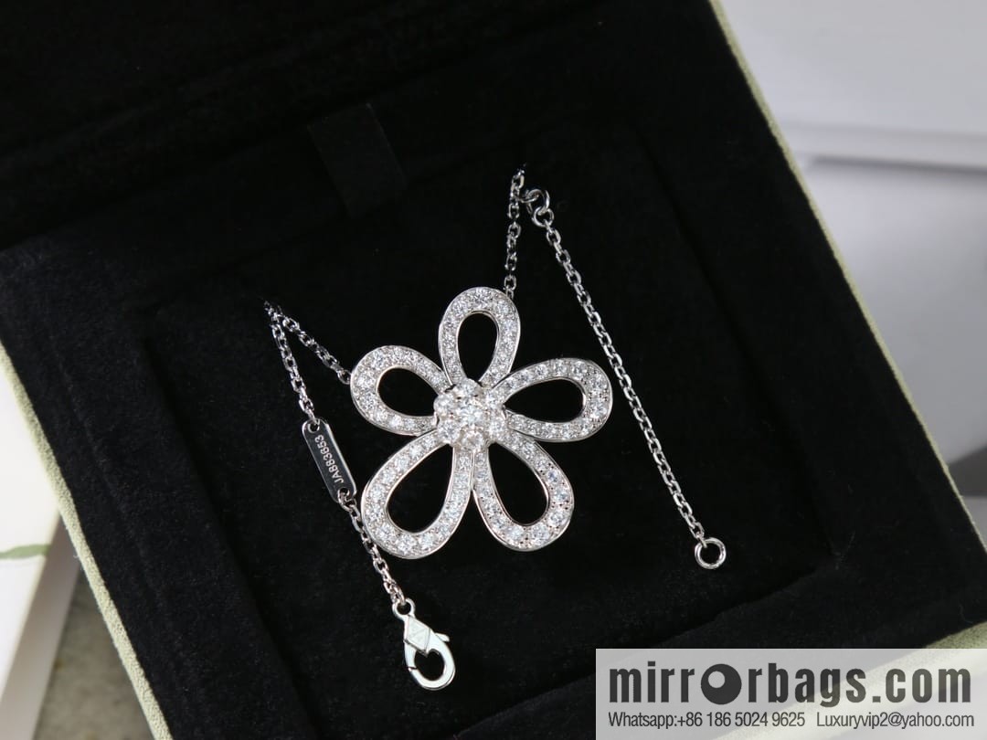 Van Cleef & Arpels Rose de Noel Diamond flower necklace earrings
