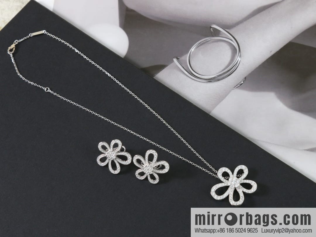 Van Cleef & Arpels Rose de Noel Diamond flower necklace earrings