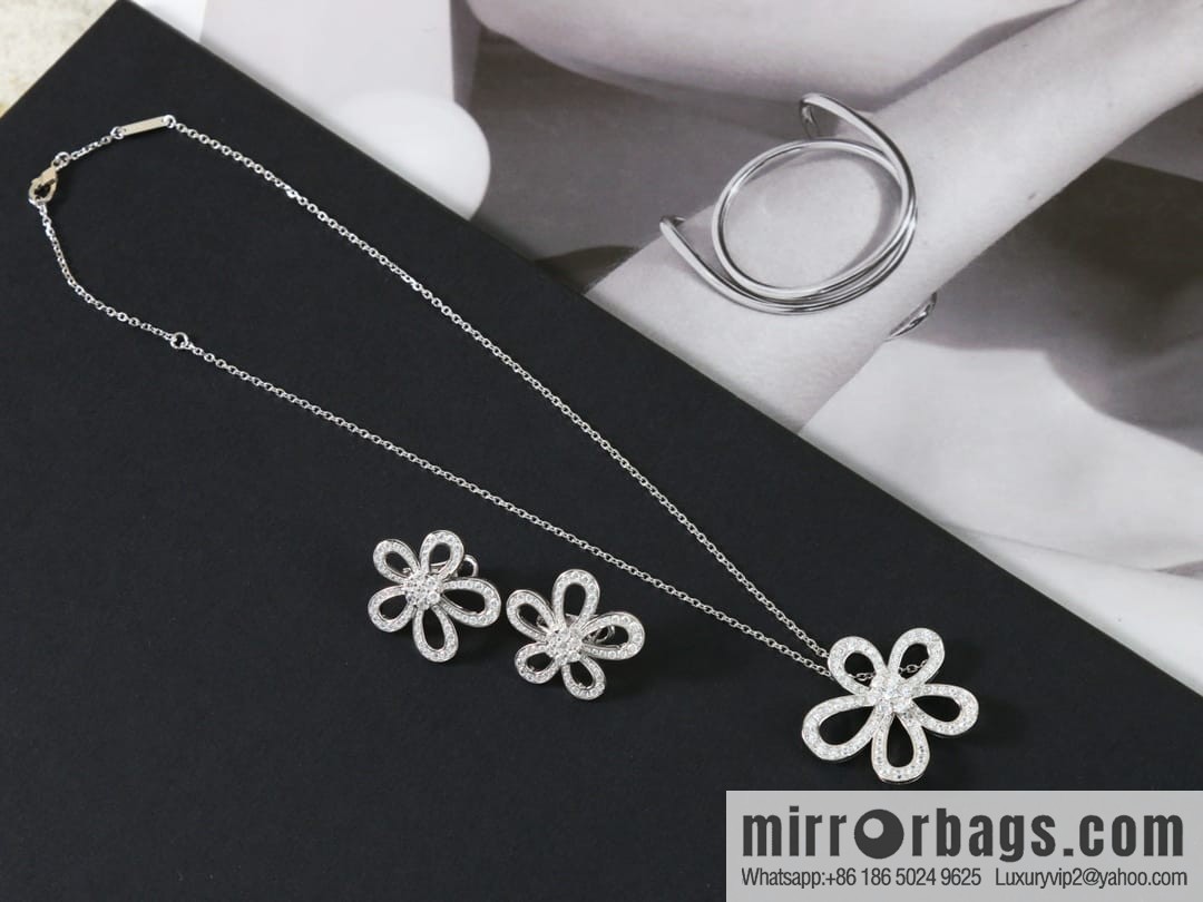 Van Cleef & Arpels Rose de Noel Diamond flower necklace earrings