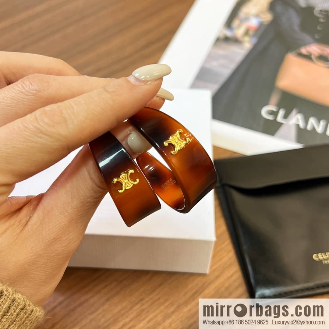 New Celine Arc de Triomphe half-bend earrings