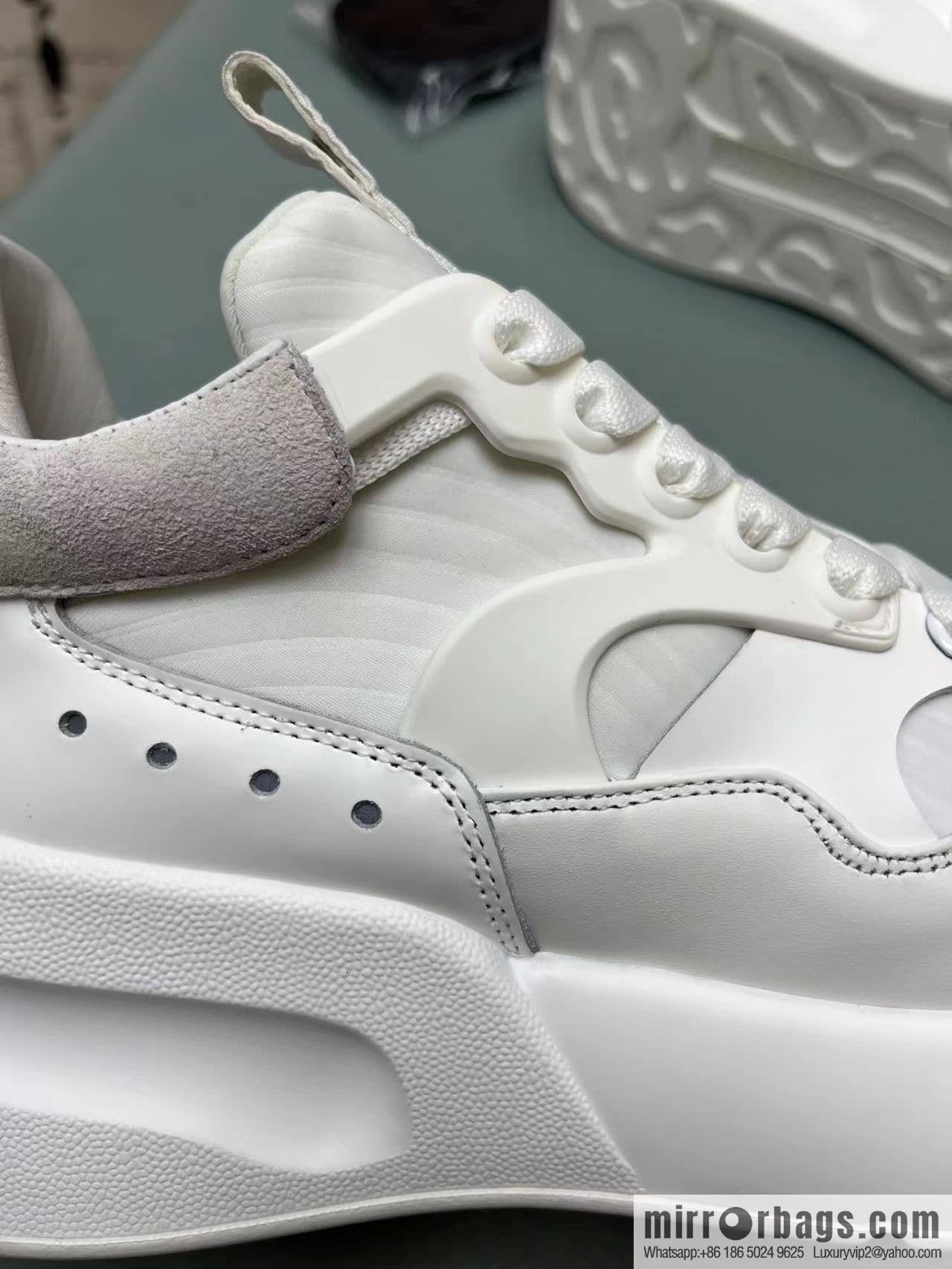Alexander McQueen with neoprene, nappa leather (fabric) and rubber upholstery His & Hers sneakers