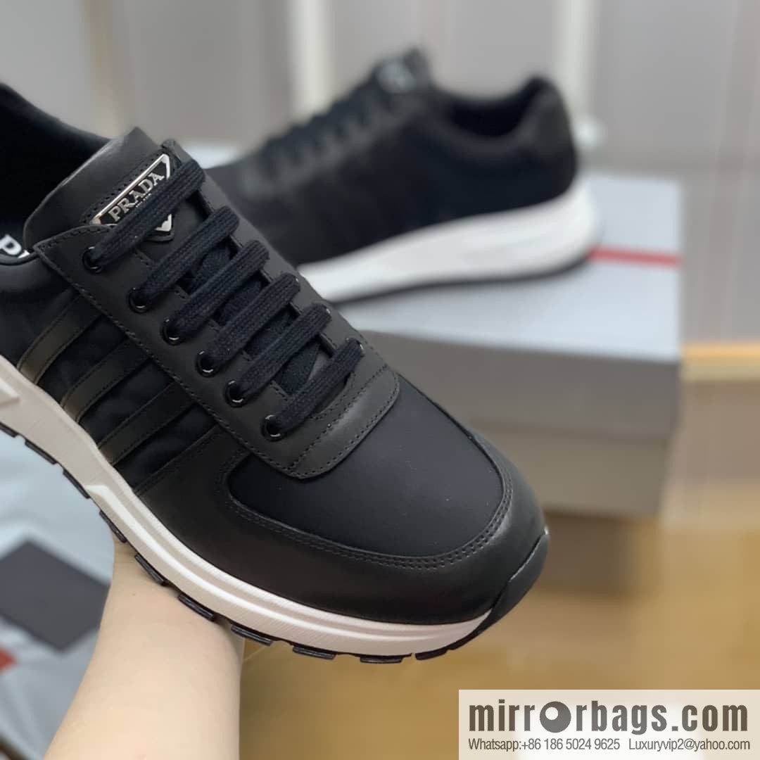 Prada is made of soft leather (fabric) and nylon patchwork men's sneakers