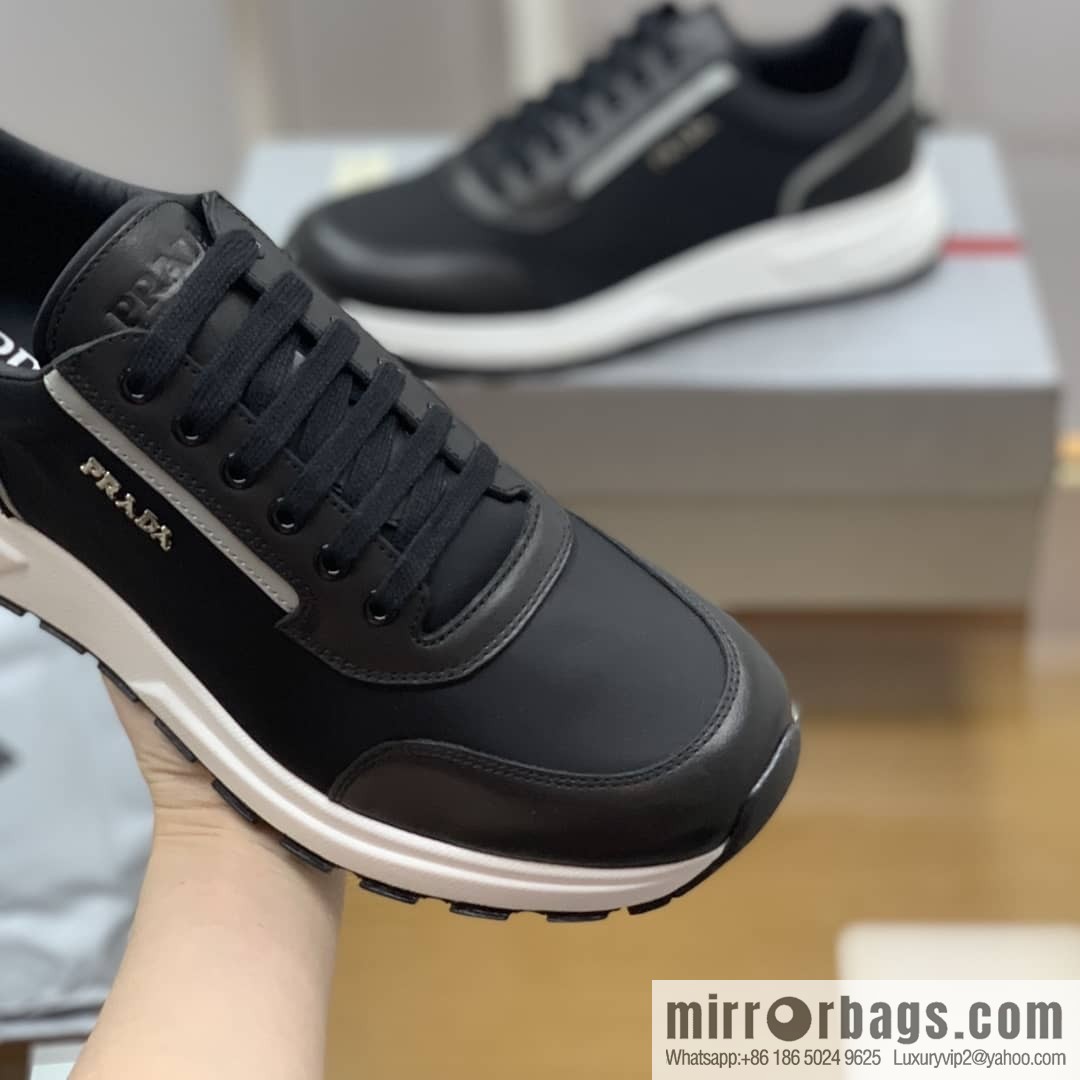 Prada is made of soft leather (fabric) and nylon patchwork men's sneakers