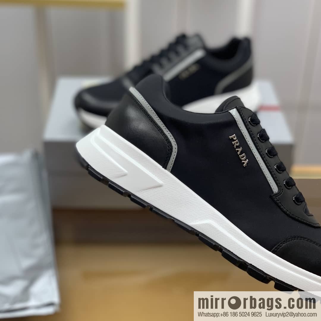 Prada is made of soft leather (fabric) and nylon patchwork men's sneakers