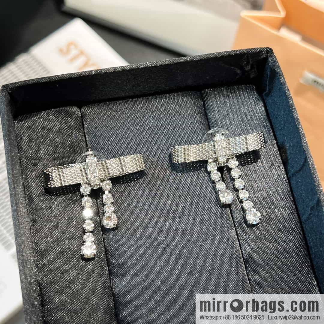 MIU MIU Miu Miu bow fringed stud earrings