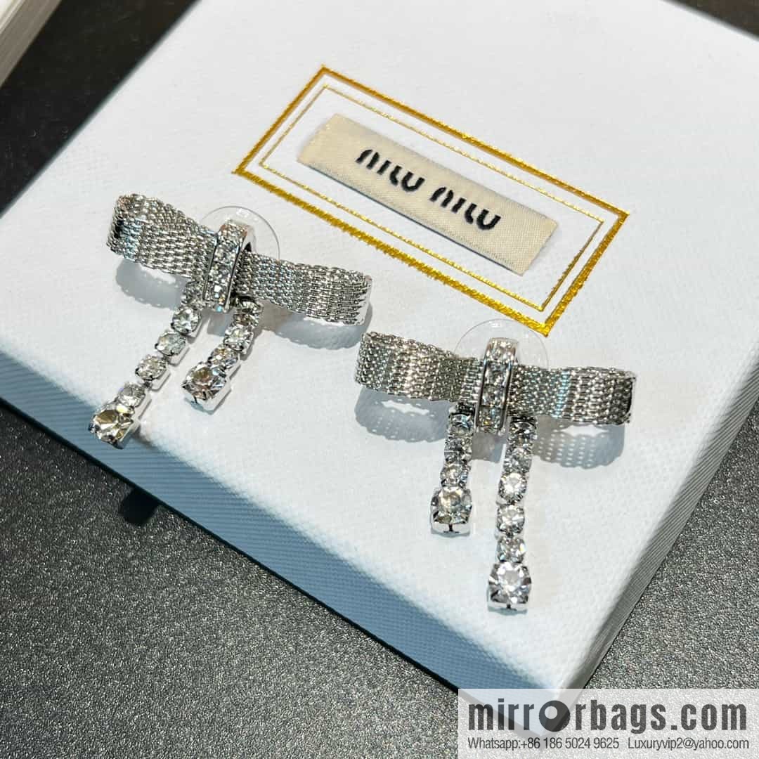 MIU MIU Miu Miu bow fringed stud earrings