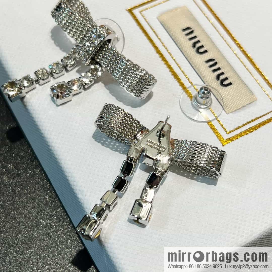 MIU MIU Miu Miu bow fringed stud earrings