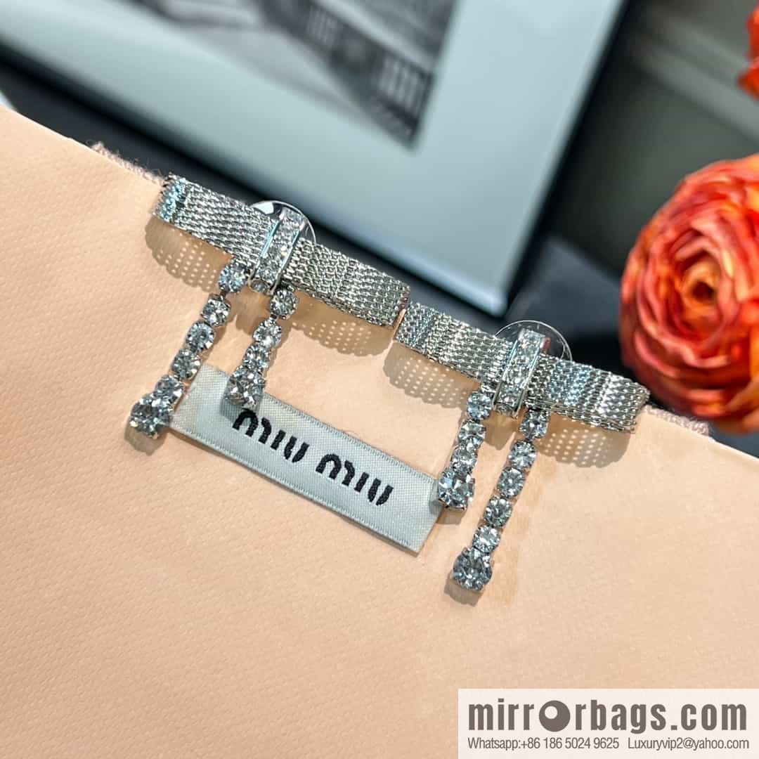 MIU MIU Miu Miu bow fringed stud earrings