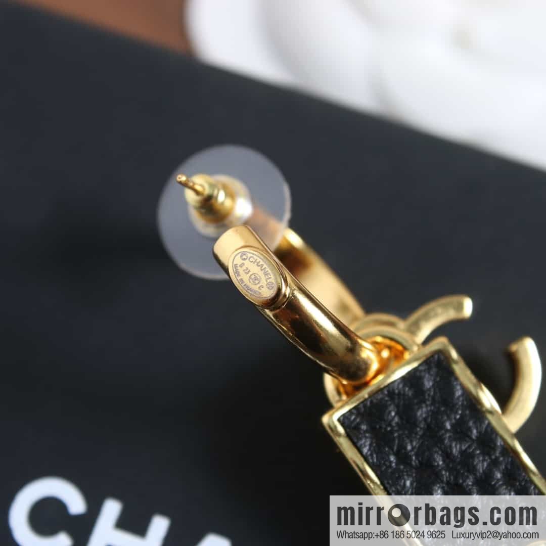 New ☑️ chanel c2 double c black strip leather earrings