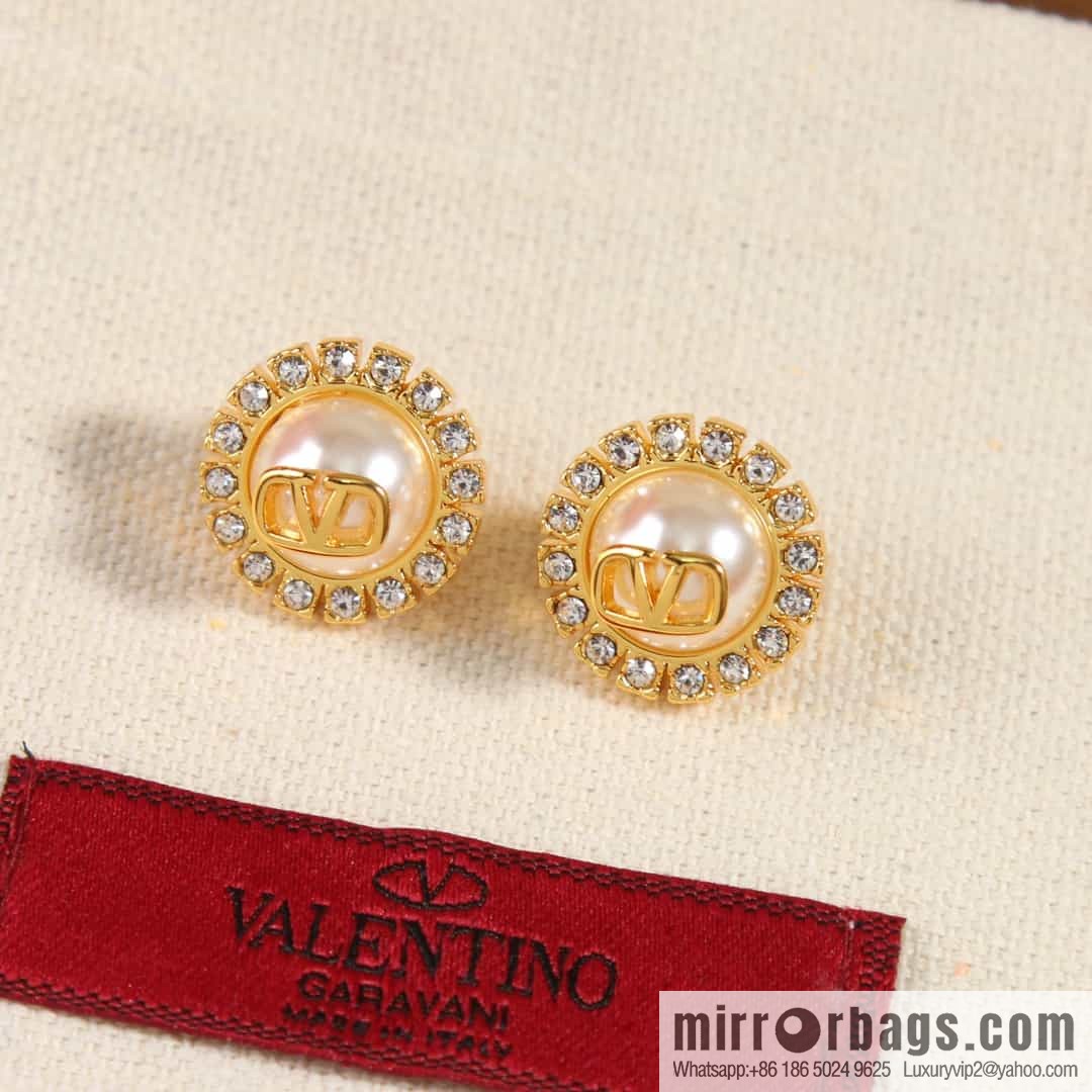 New ☑️ Valentino stud earrings