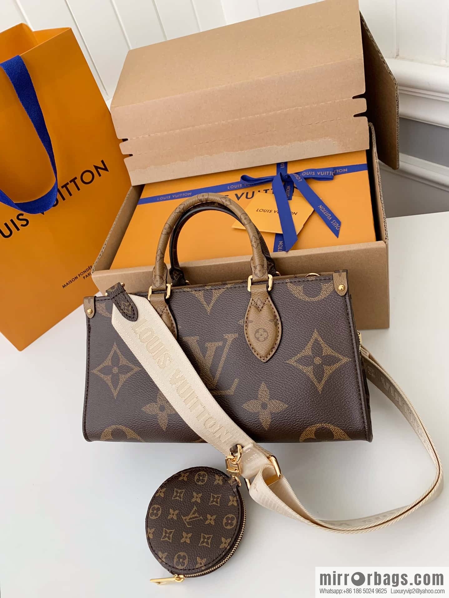 LV M46653 OnTheGo East West