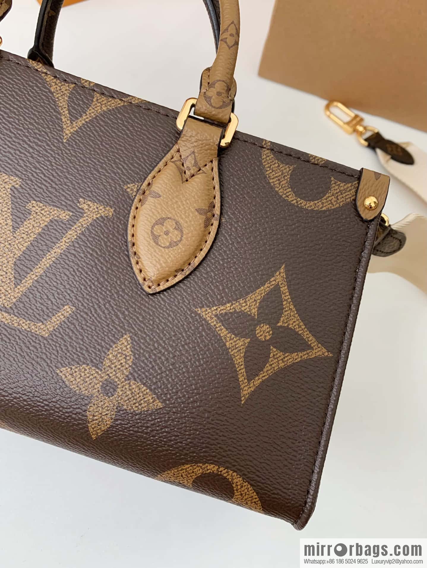 LV M46653 OnTheGo East West