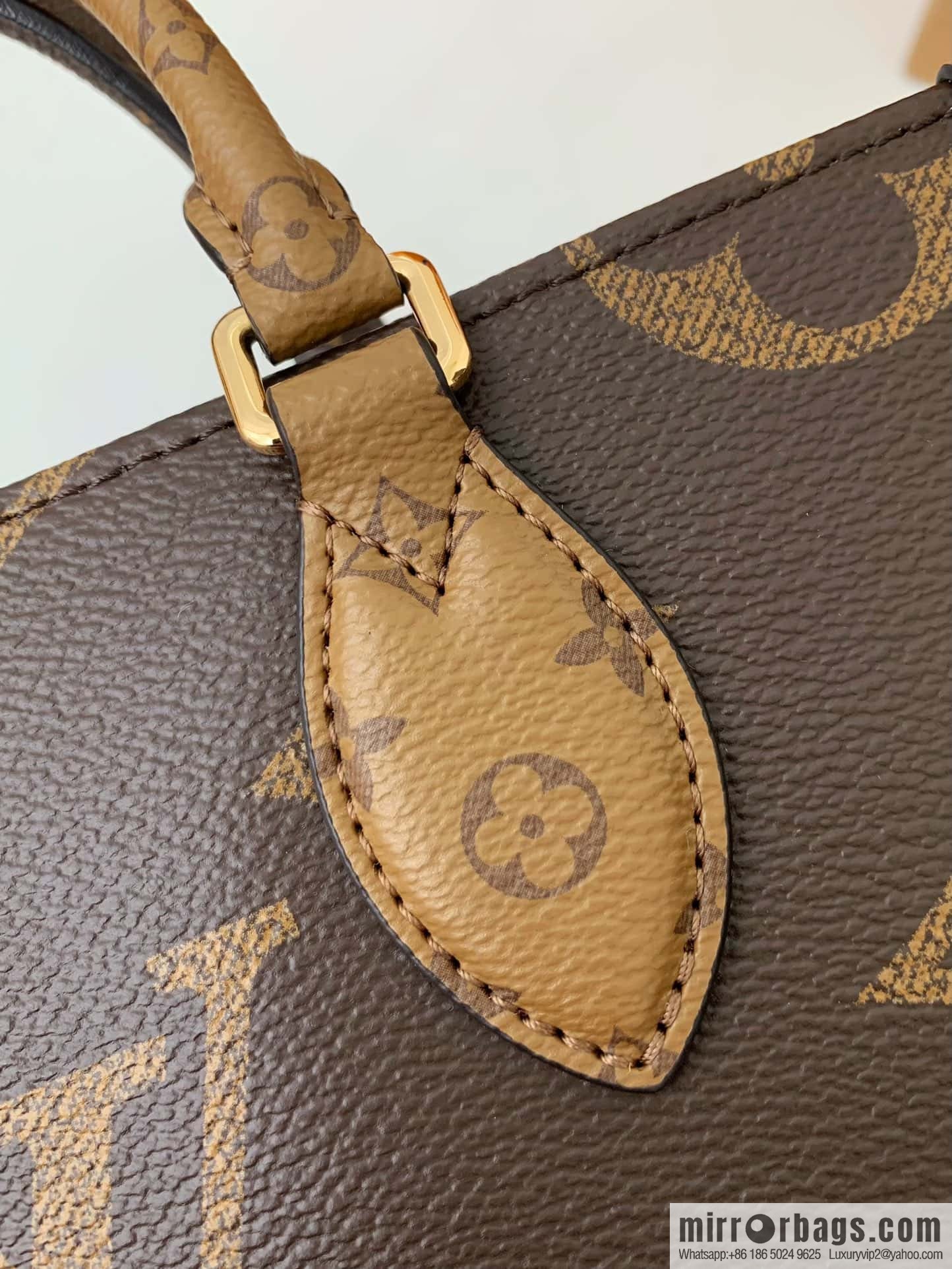 LV M46653 OnTheGo East West