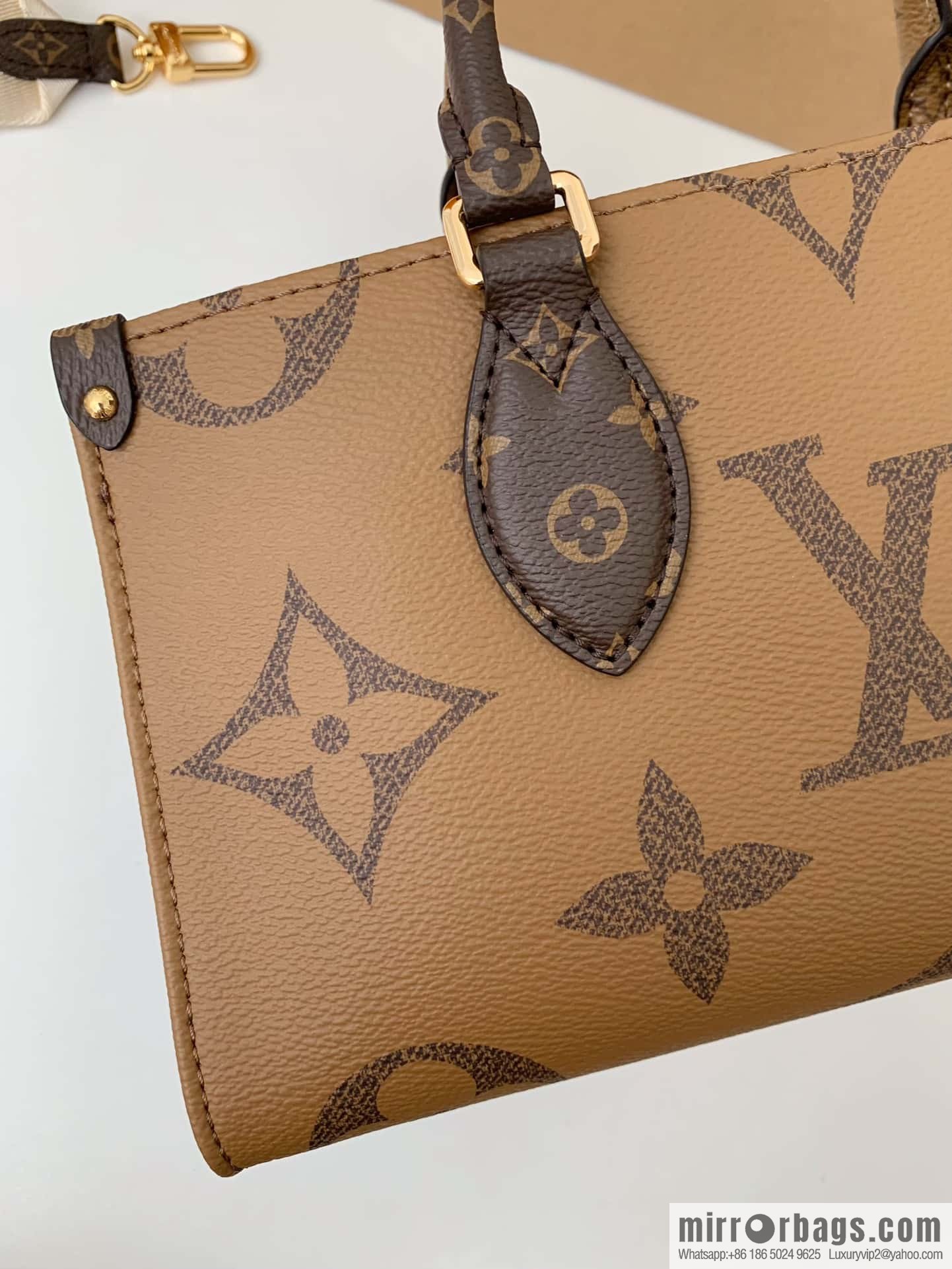 LV M46653 OnTheGo East West