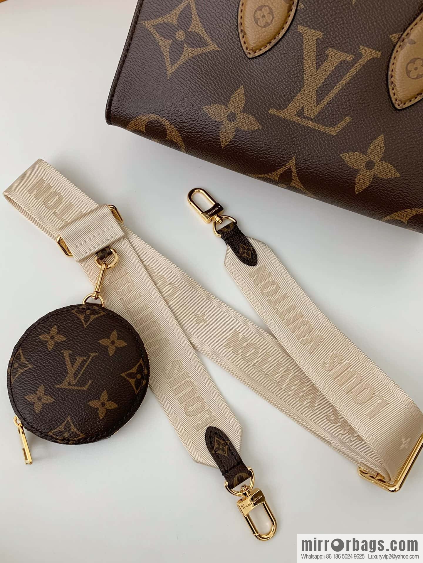 LV M46653 OnTheGo East West