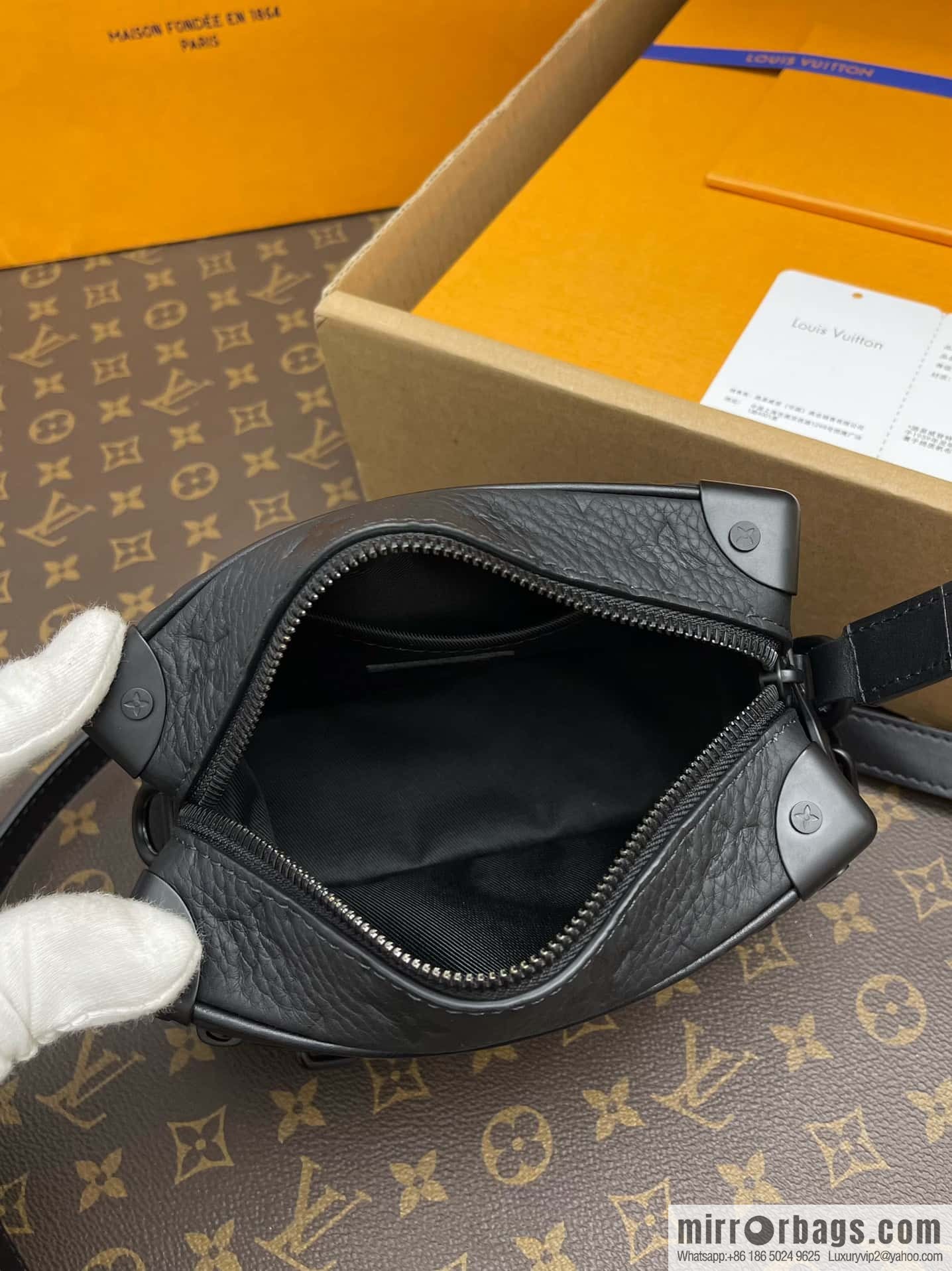 LV M55702 Mini Soft Trunk