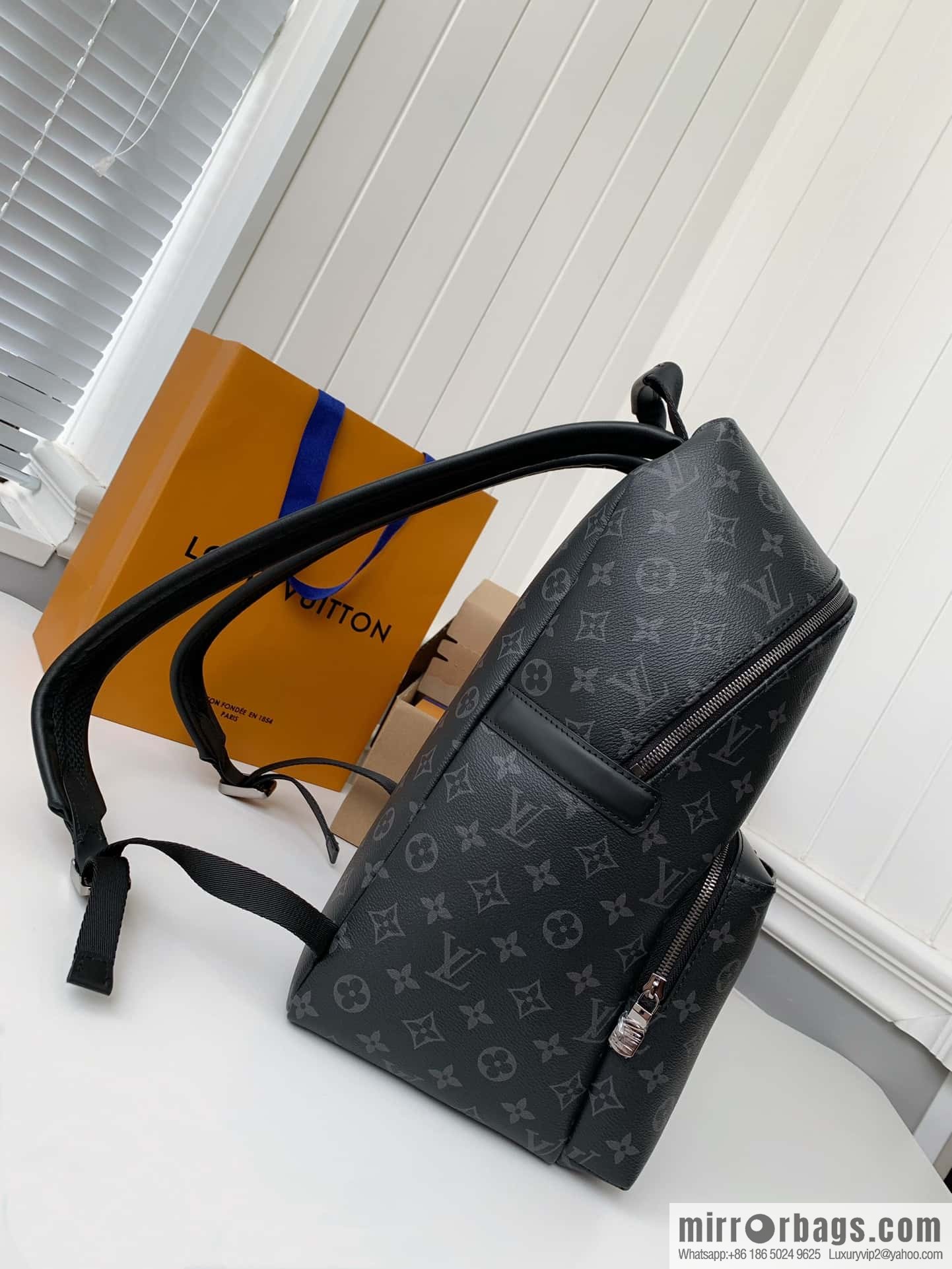 LV M43186 Discovery Backpack PM