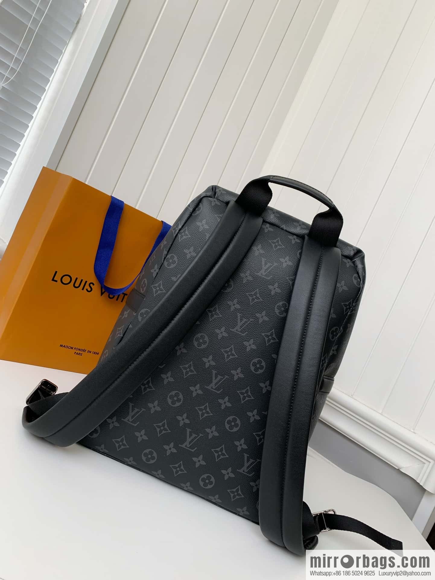 LV M43186 Discovery Backpack PM