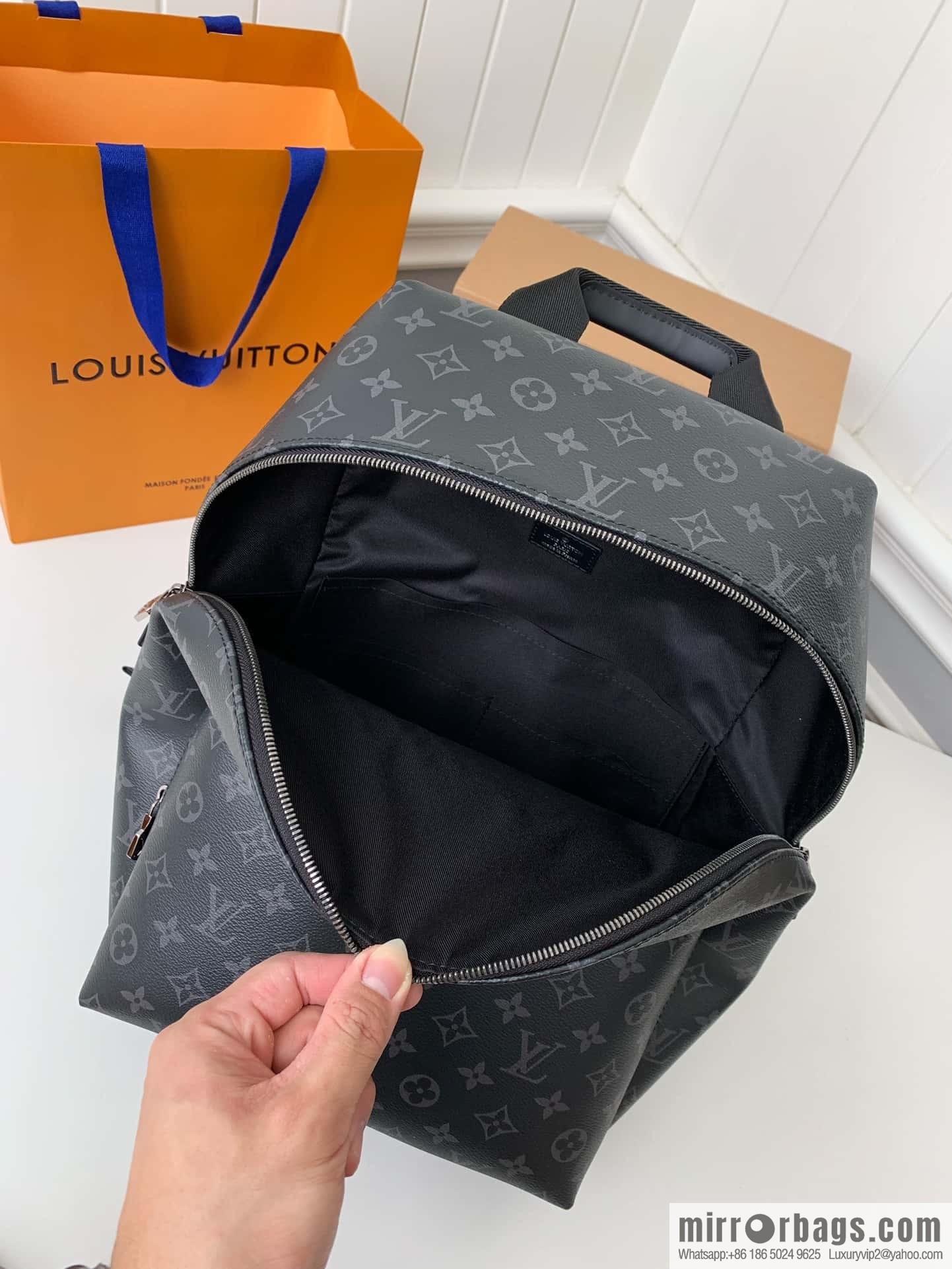LV M43186 Discovery Backpack PM