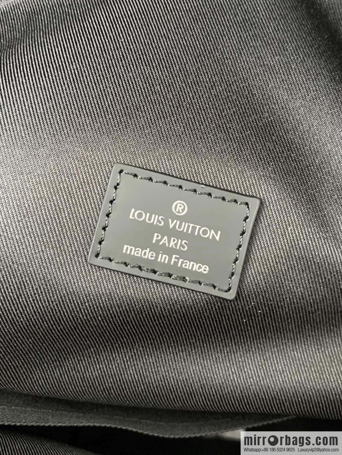 LV M43186 Discovery Backpack PM